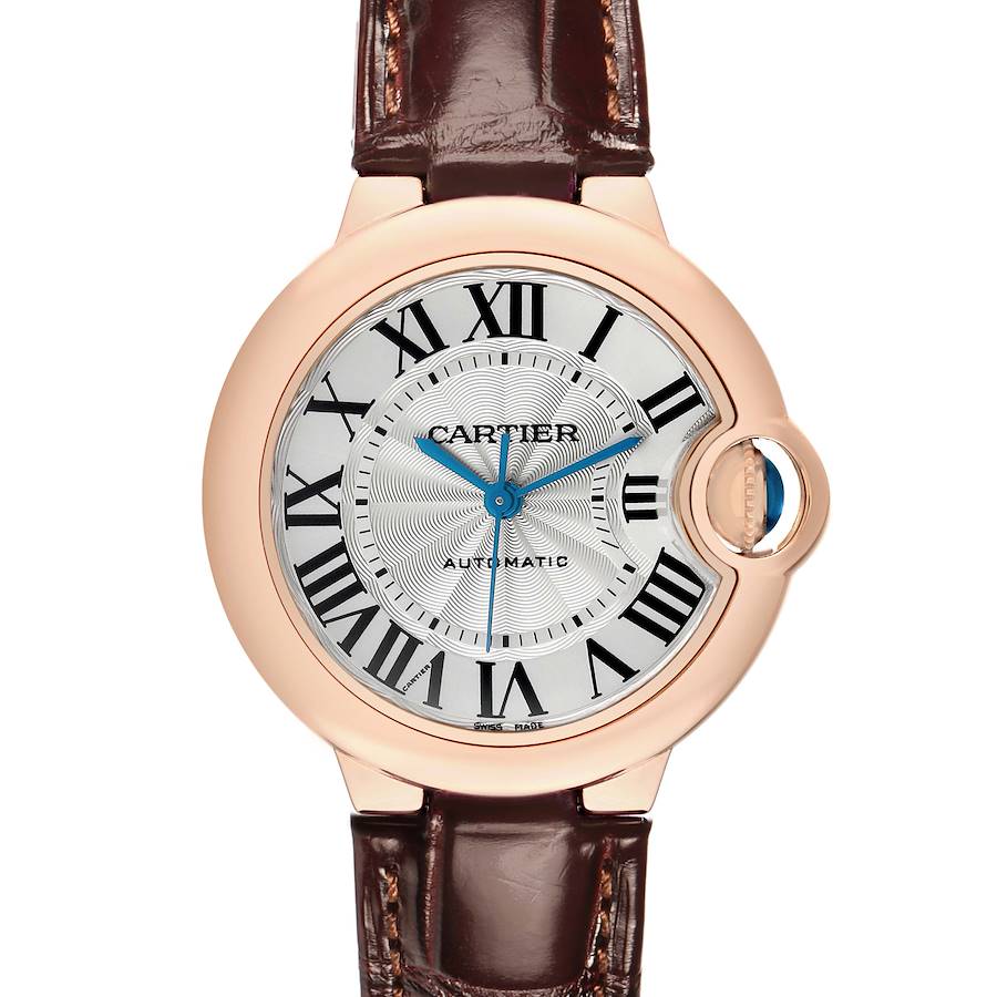 The image shows a Cartier Ballon Bleu W6920097 Women's Rose Gold Silver Dial watch from a front angle, highlighting the dial, crown, and leather strap.