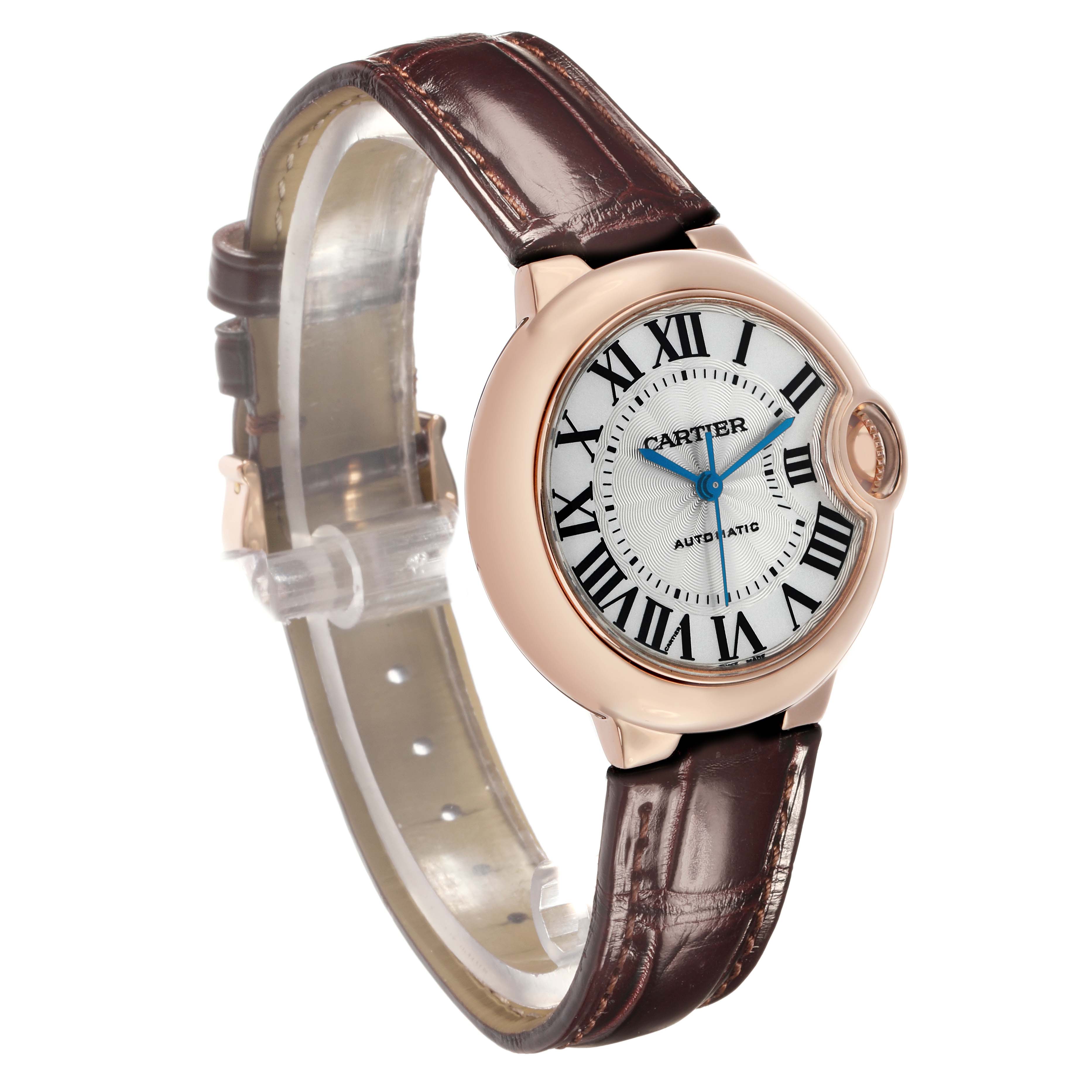 The Cartier Ballon Bleu W6920097 Women's Rose Gold Silver Dial watch is shown at a slight angle, highlighting its face, Roman numerals, and brown leather strap.