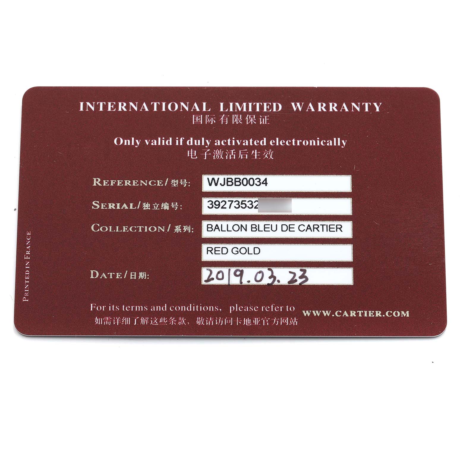 The image shows an "International Limited Warranty" card for the Ballon Bleu de Cartier watch.