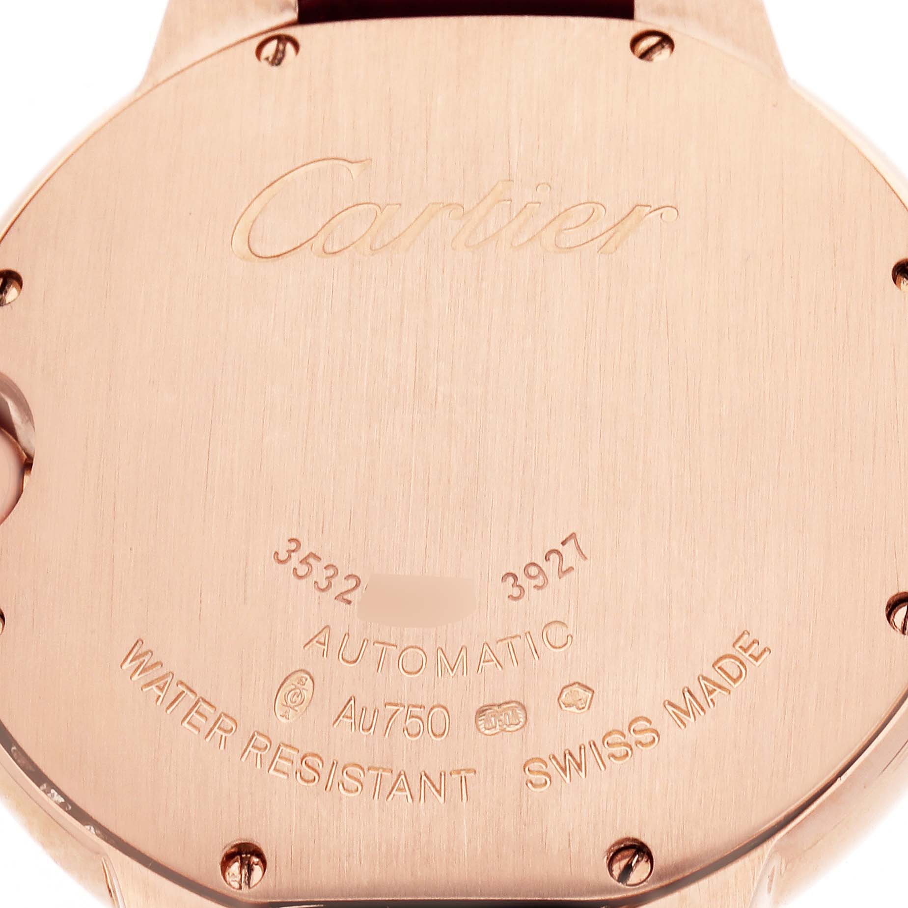 The image shows the back of a Cartier Ballon Bleu WJBB0034 Women's Rose Gold Silver Dial watch, highlighting engravings and serial numbers.