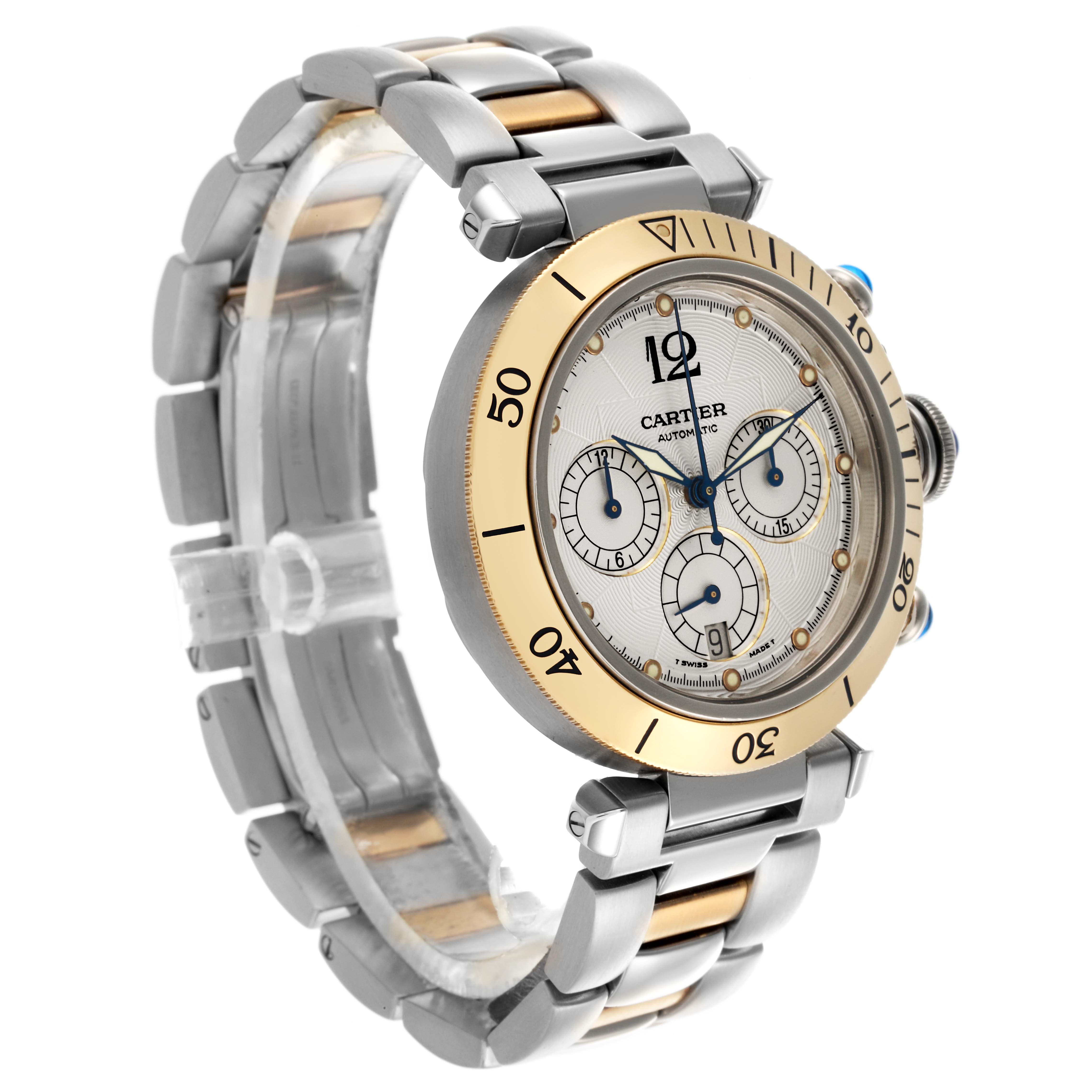 The Cartier Pasha W31036T6 Men's Steel and Gold (two tone) Silver Dial W31036T6 Men's Steel and Gold (two tone) Silver Dial watch is shown at a three-quarter angle, highlighting the face, bezel, and metal bracelet.
