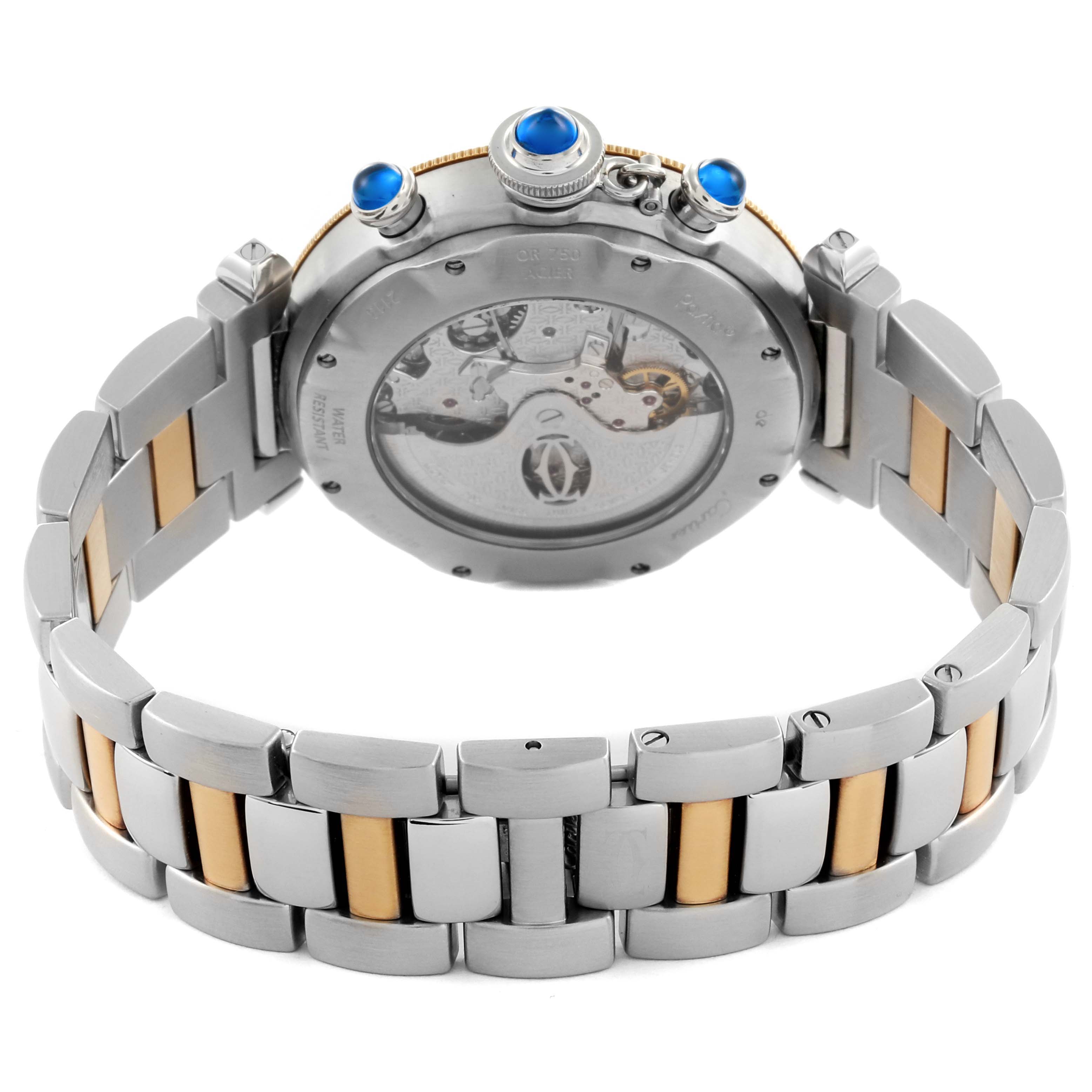The Cartier Pasha W31036T6 Men's Steel and Gold (two tone) Silver Dial W31036T6 Men's Steel and Gold (two tone) Silver Dial watch is shown from the back, displaying its transparent case back and dual-tone bracelet.