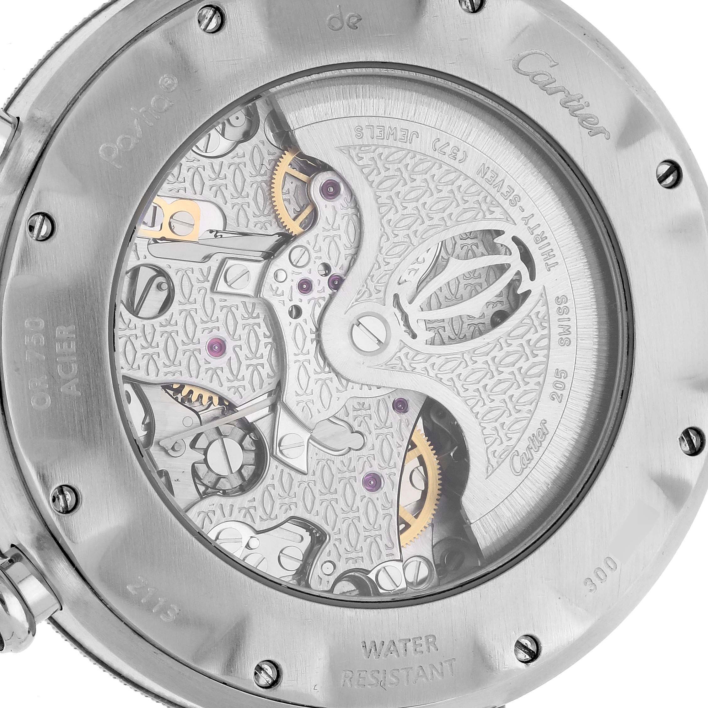 The image shows the back of a Cartier Pasha W31036T6 Men's Steel and Gold (two tone) Silver Dial W31036T6 Men's Steel and Gold (two tone) Silver Dial watch, highlighting its intricate movement and engravings.