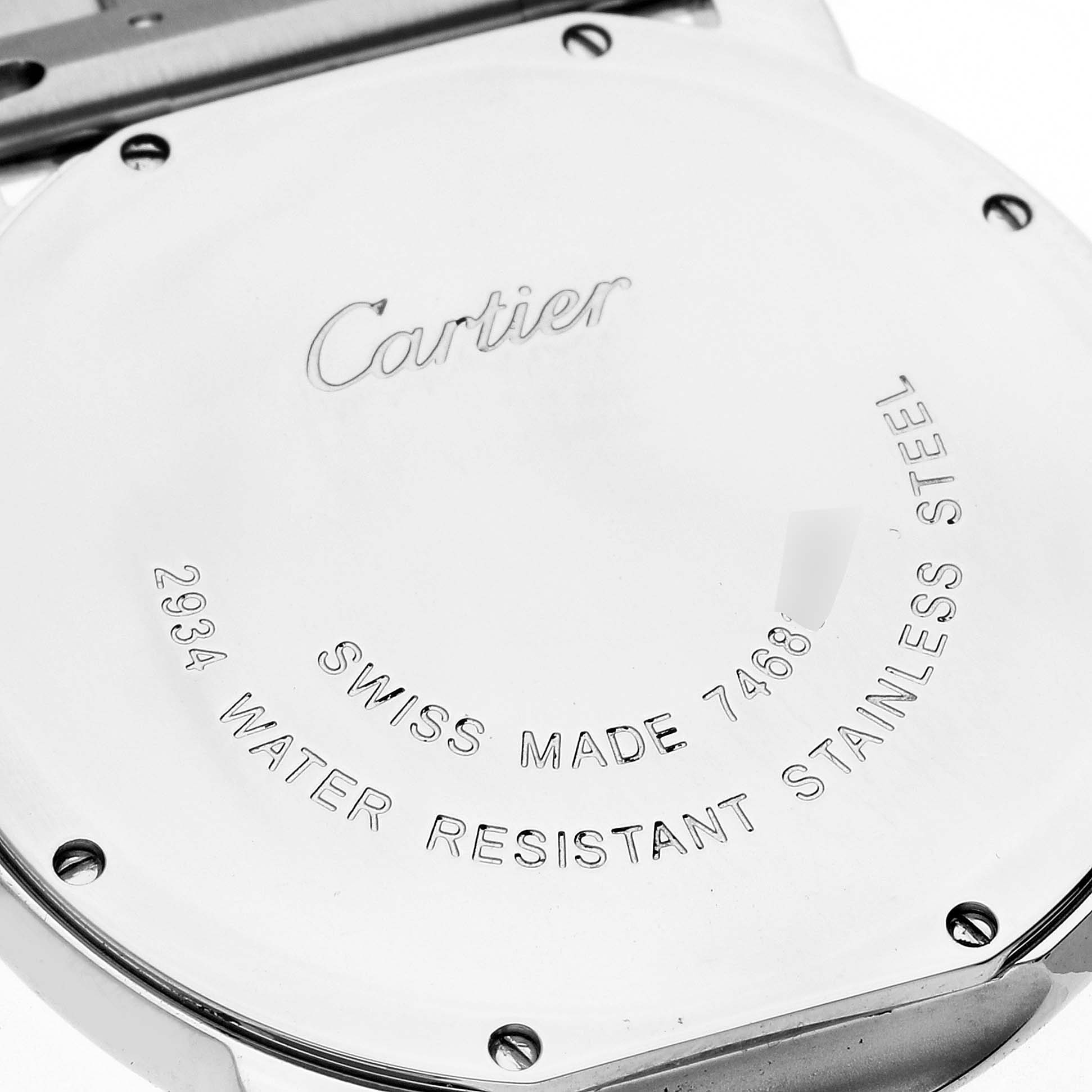 This image shows the back case of the Ronde model by Cartier, highlighting engravings and screw details.