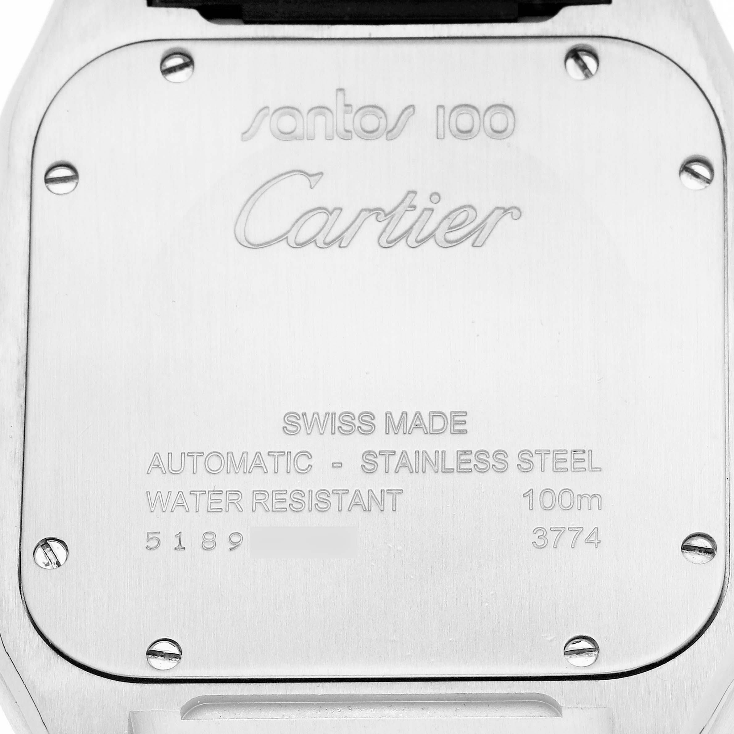 The image shows the back case of a Cartier Santos W20073X8 Men's Stainless Steel Silver Dial watch, highlighting engravings and screws.