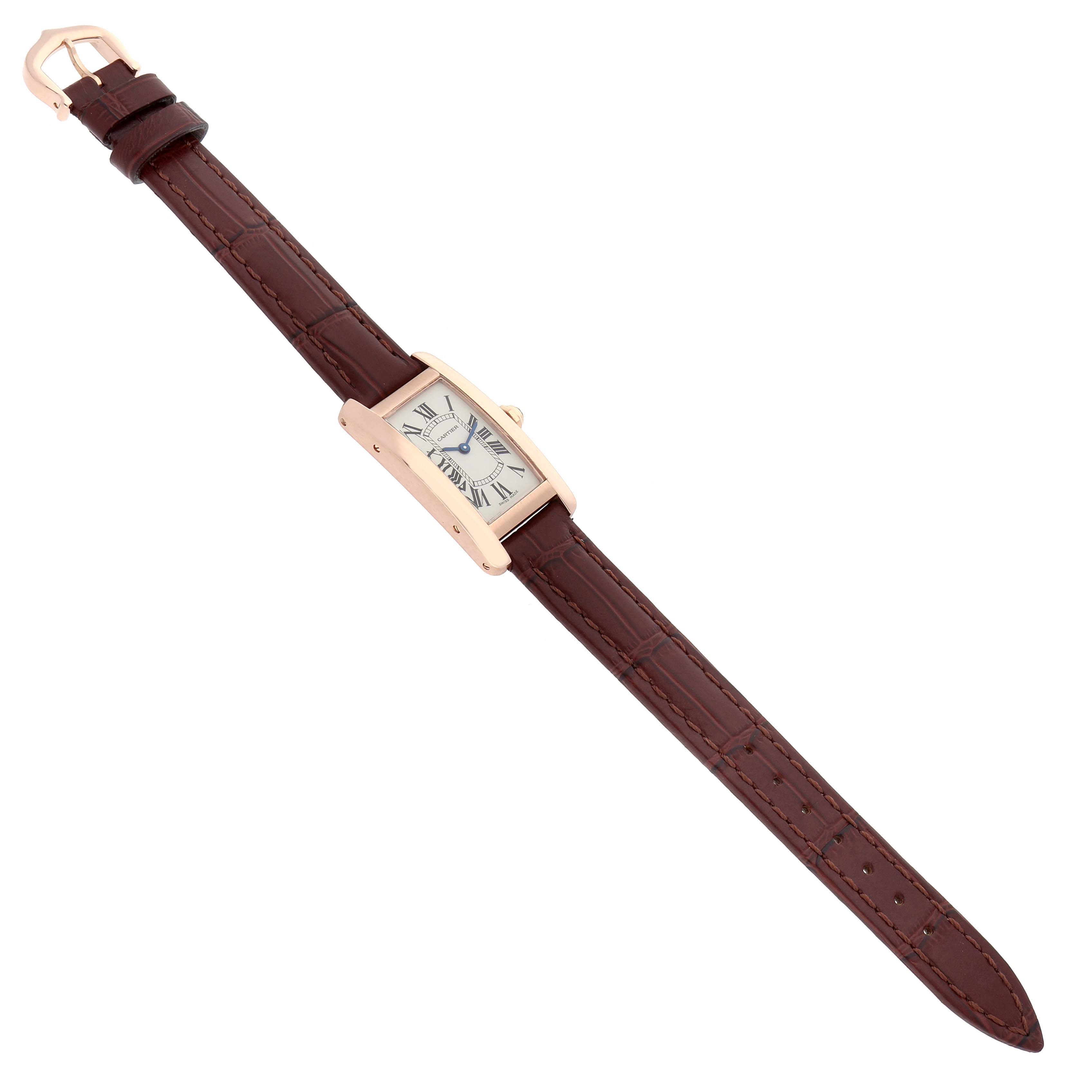 The Cartier Tank Americaine W2607456 Women's Rose Gold Silver Dial watch is shown at a slight angle, displaying the face, case, and leather strap.