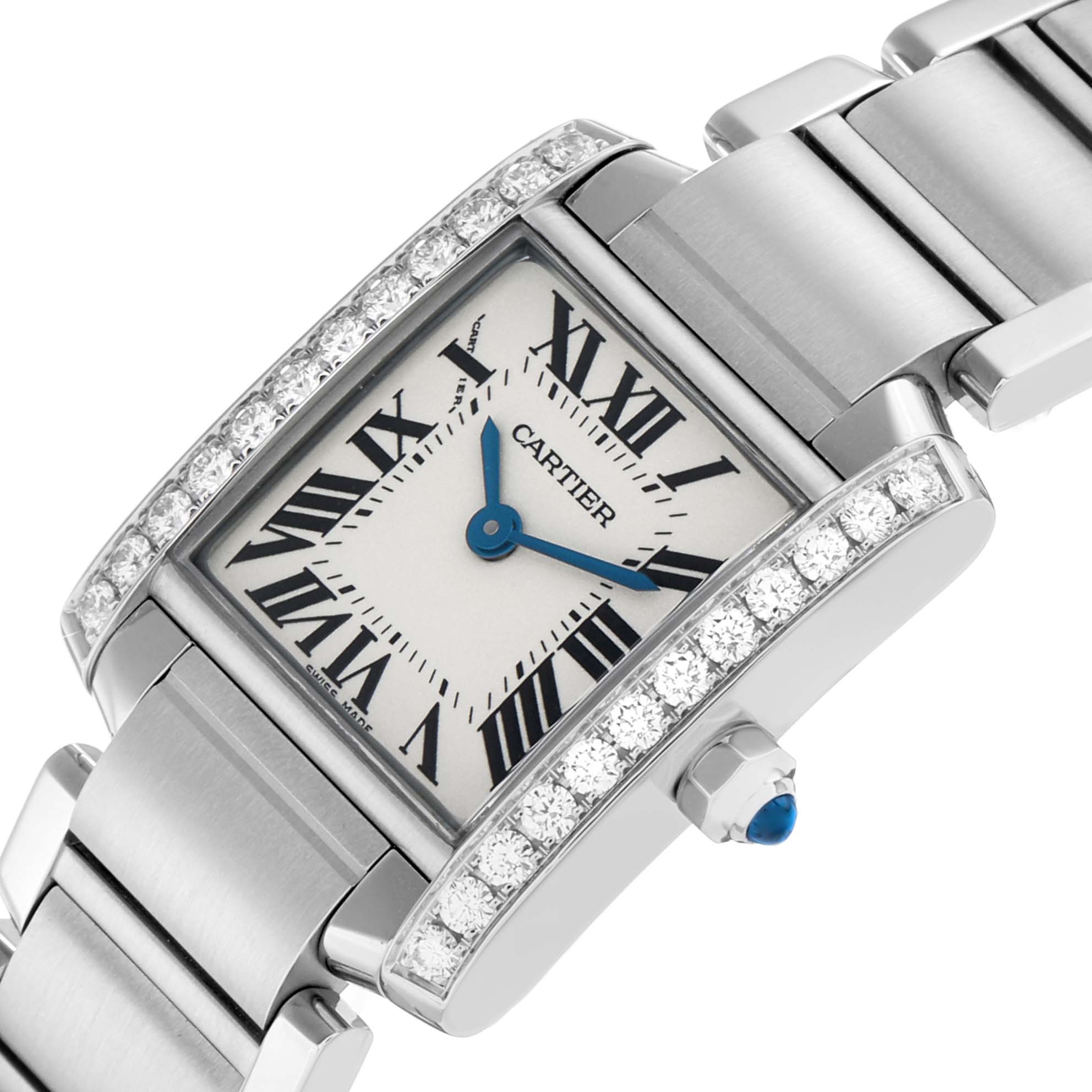 The Cartier Tank Française watch is shown at an angled close-up, highlighting its diamond-set bezel, Roman numeral dial, and bracelet.