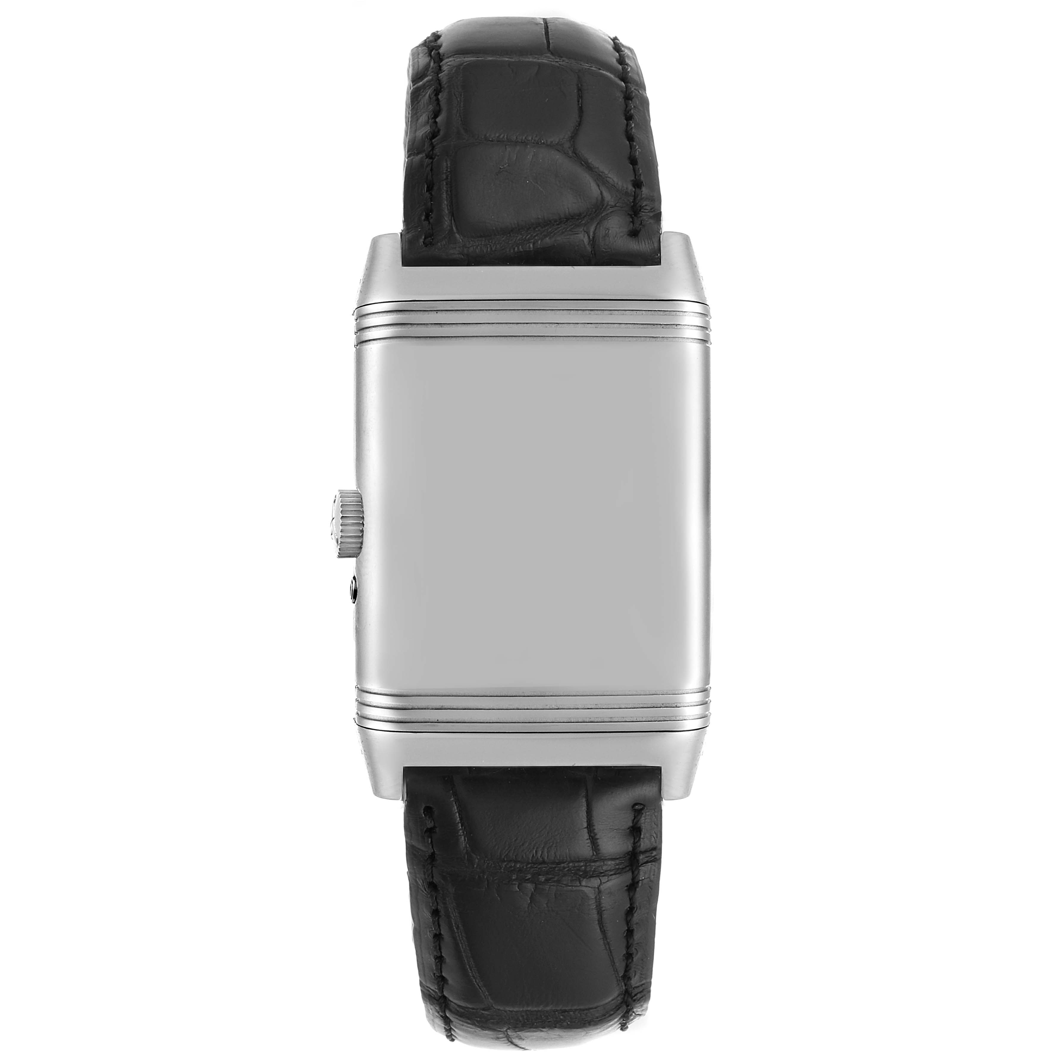 This image shows a top-down view of a Jaeger LeCoultre Reverso 270.8.36 Men's Stainless Steel Silver Dial 270.8.36 Men's Stainless Steel Silver Dial watch displaying its leather strap and reverse side of the case.