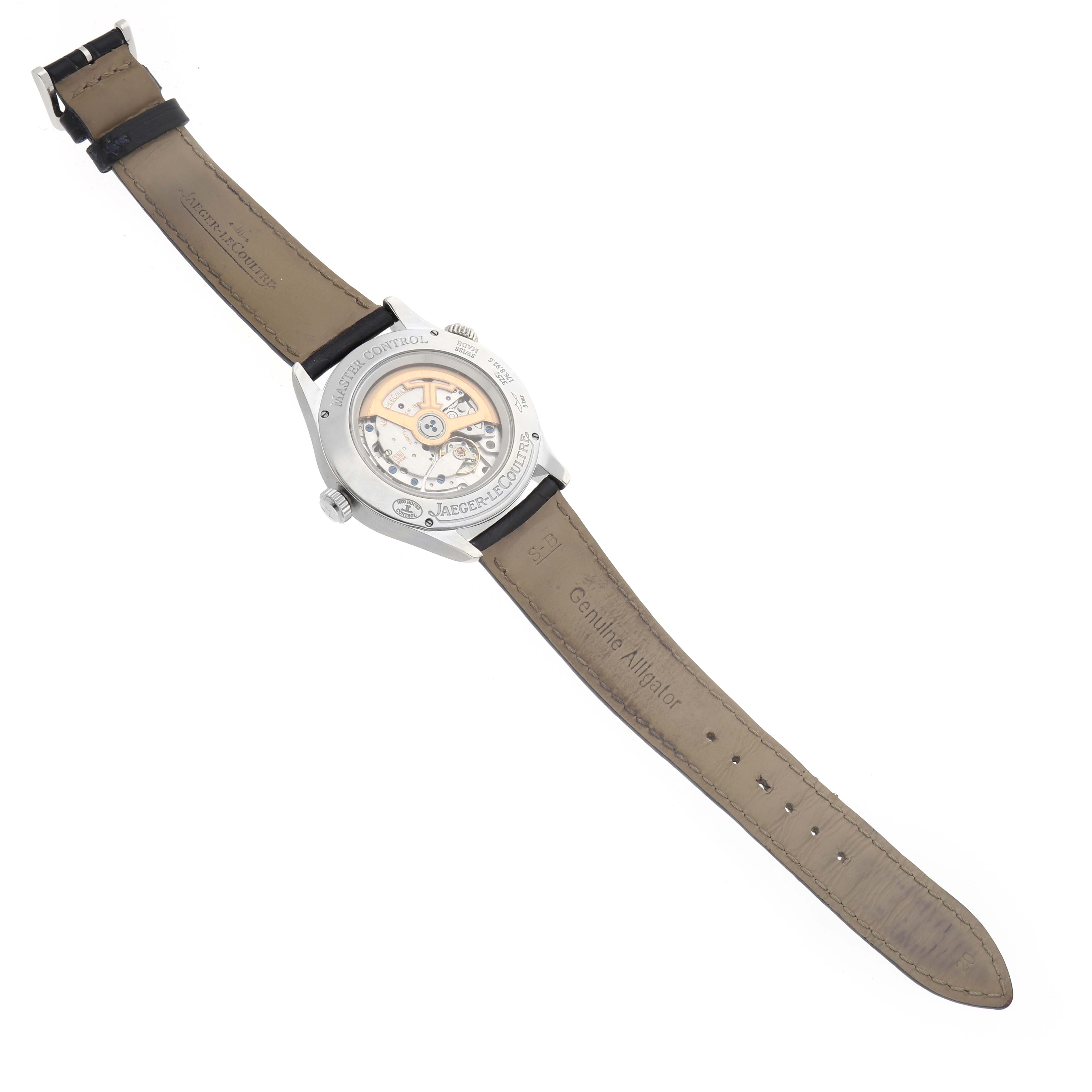 The image shows the back view of a Jaeger-LeCoultre Master model, highlighting the movement and leather strap.