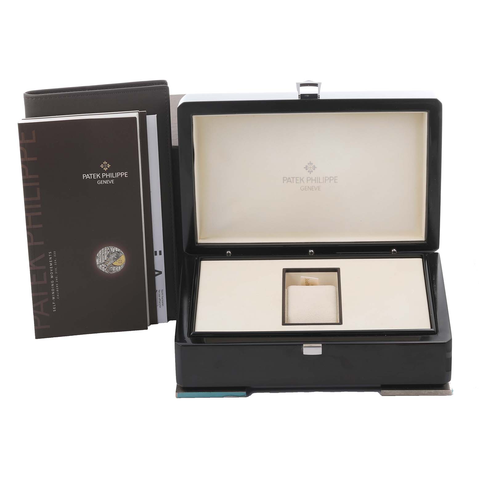 The image shows the open box and manuals for a Patek Philippe Complications 5396R-011 Men
s Rose Gold Silver Dial 5396R-011 Men
s Rose Gold Silver Dial watch.