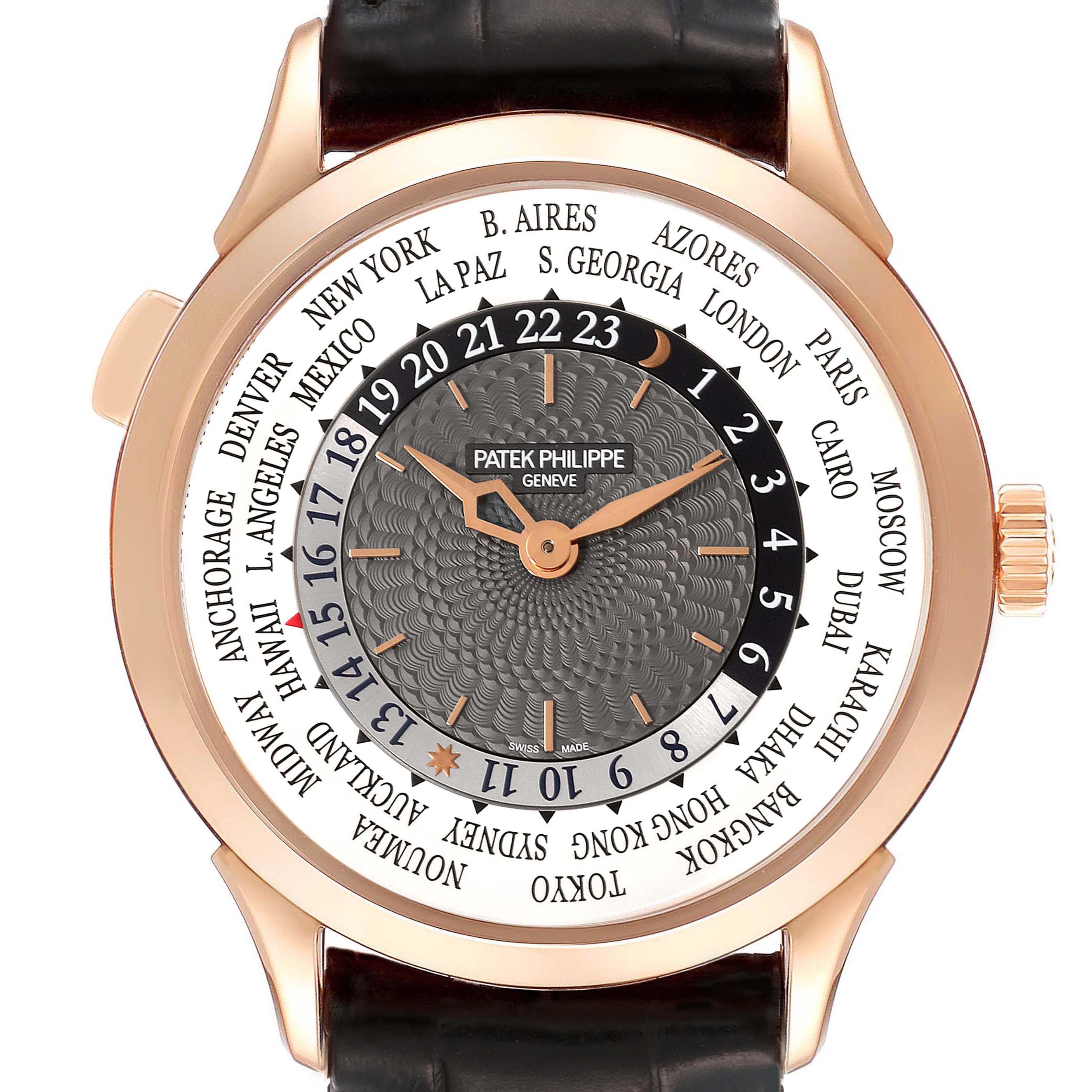 The Patek Philippe Complications 5230R-001 Men's Rose Gold Silver Dial 5230R-001 Men's Rose Gold Silver Dial watch is shown from a front angle, displaying the dial, watch hands, crown, and city names for world time.