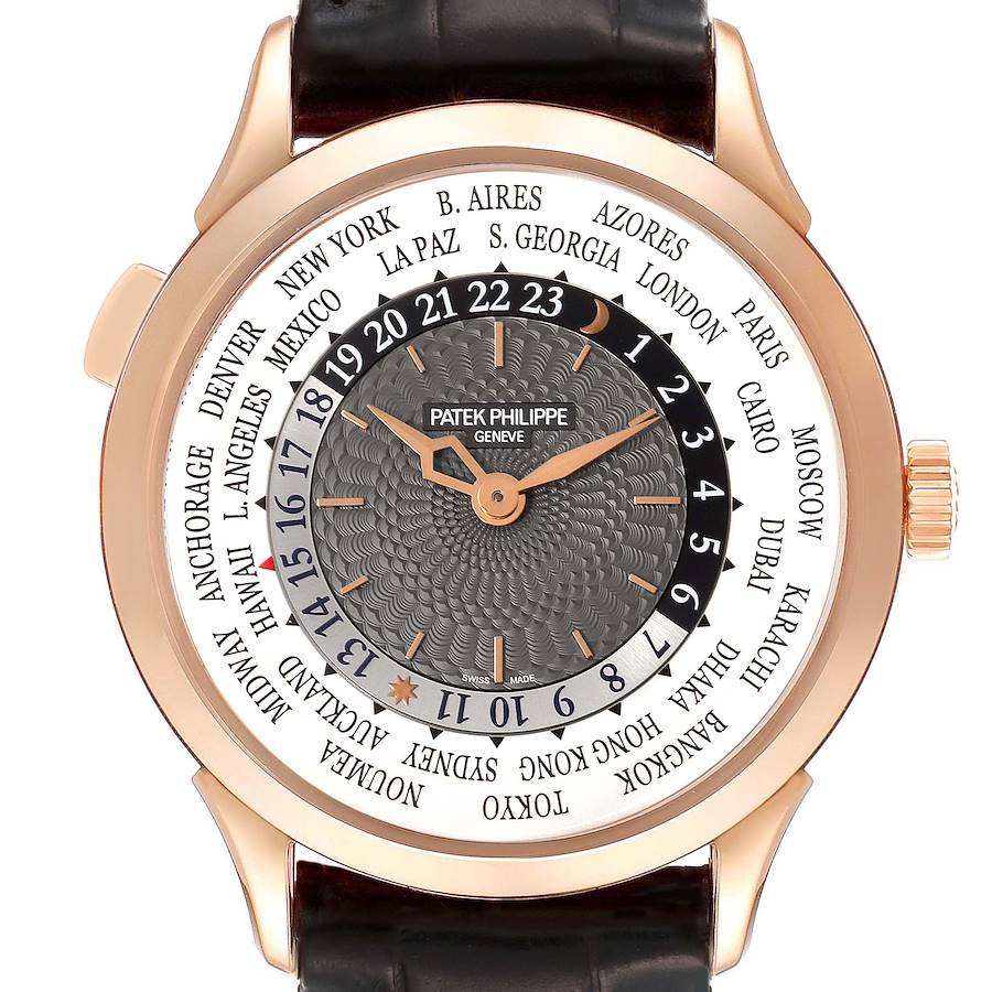 The Patek Philippe Complications watch is shown from a front angle, displaying the dial, watch hands, crown, and city names for world time.