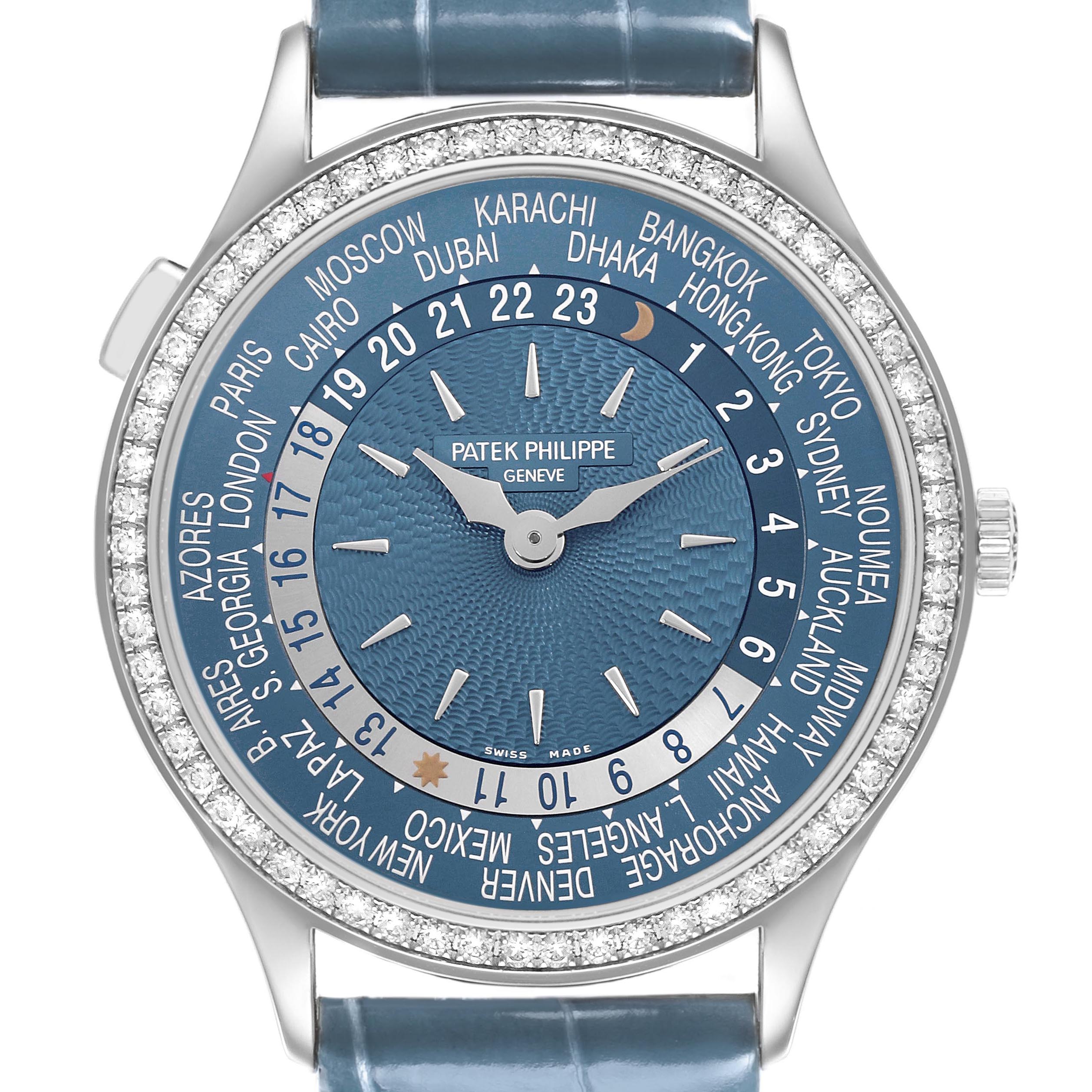 The Patek Philippe Complications 7130G-014 Men's White Gold Blue Dial watch is shown from the front, highlighting its blue dial, world time feature, and diamond bezel.