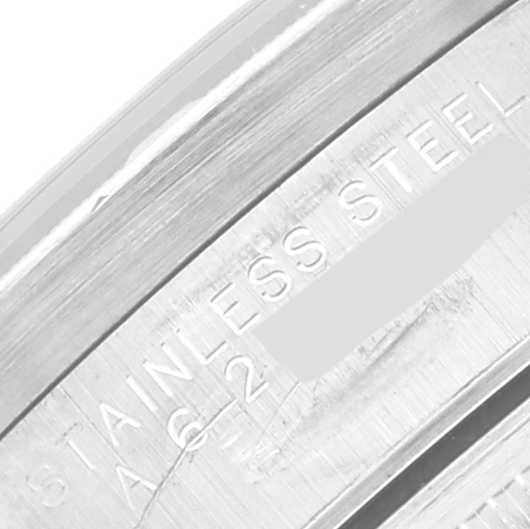 This close-up shows the stainless steel engraving on the bezel of a Rolex Air-King 14010 Men's Stainless Steel Blue Dial 14010 Men's Stainless Steel Blue Dial watch.