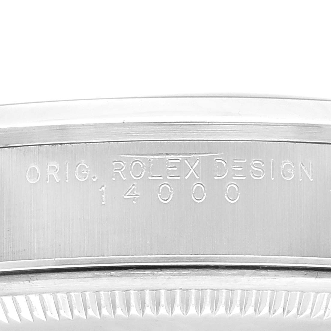 The image shows an angled close-up of the Air-King model by Rolex, highlighting the engraved model number and "ROLEX DESIGN" text on the case side.