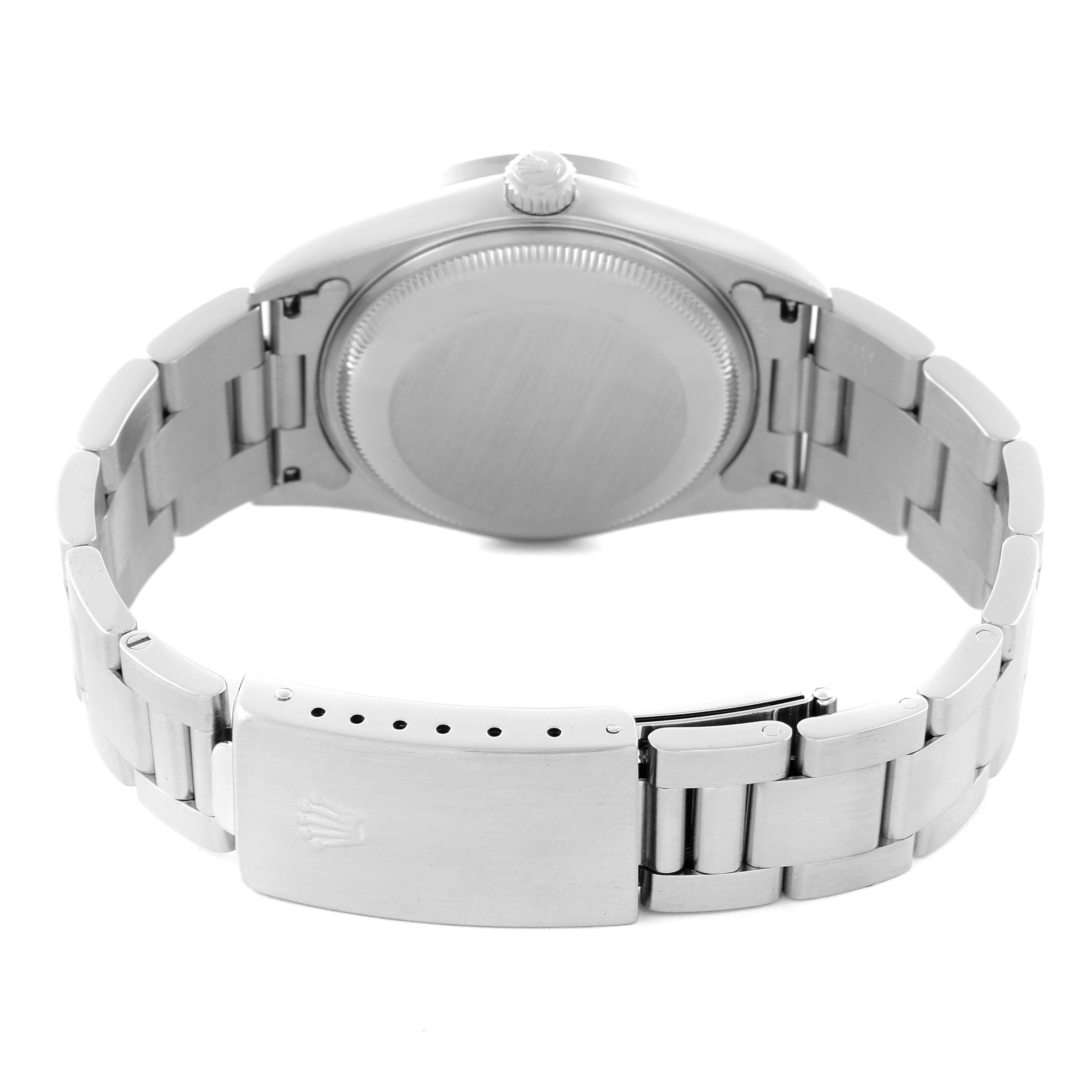 The image shows the back case and bracelet clasp of a Rolex Date 15210 Men's Stainless Steel Blue Dial 15210 Men's Stainless Steel Blue Dial model watch from the rear angle.