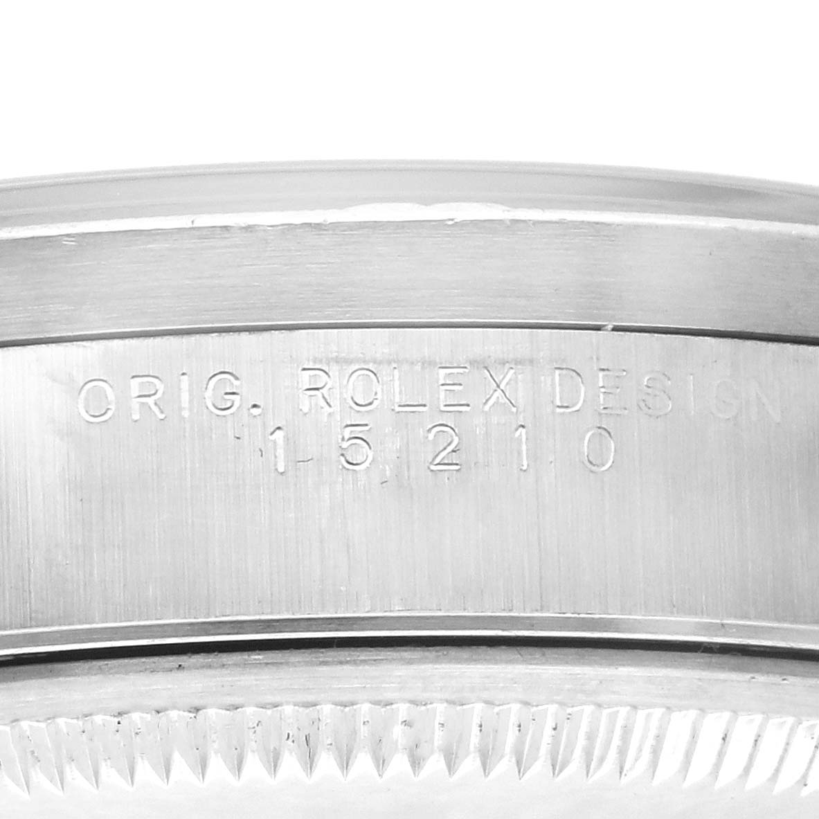 The image shows a close-up of the case edge with the model number "15210" engraved on a Rolex Date 15210 Men's Stainless Steel Blue Dial 15210 Men's Stainless Steel Blue Dial watch.