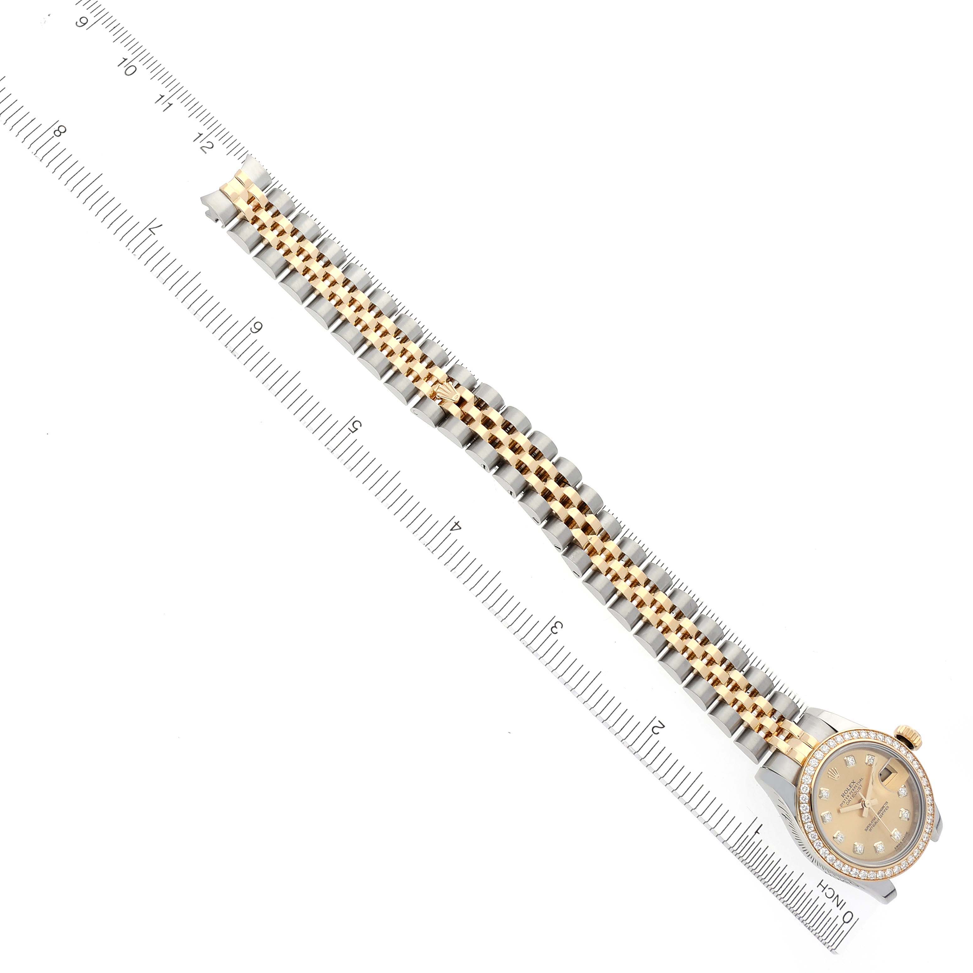The image shows a Rolex Datejust 179383 Women's Steel and Gold (two tone) Champagne Dial 179383 Women's Steel and Gold (two tone) Champagne Dial at an overhead angle, displaying the full length of the watch and its two-tone bracelet.