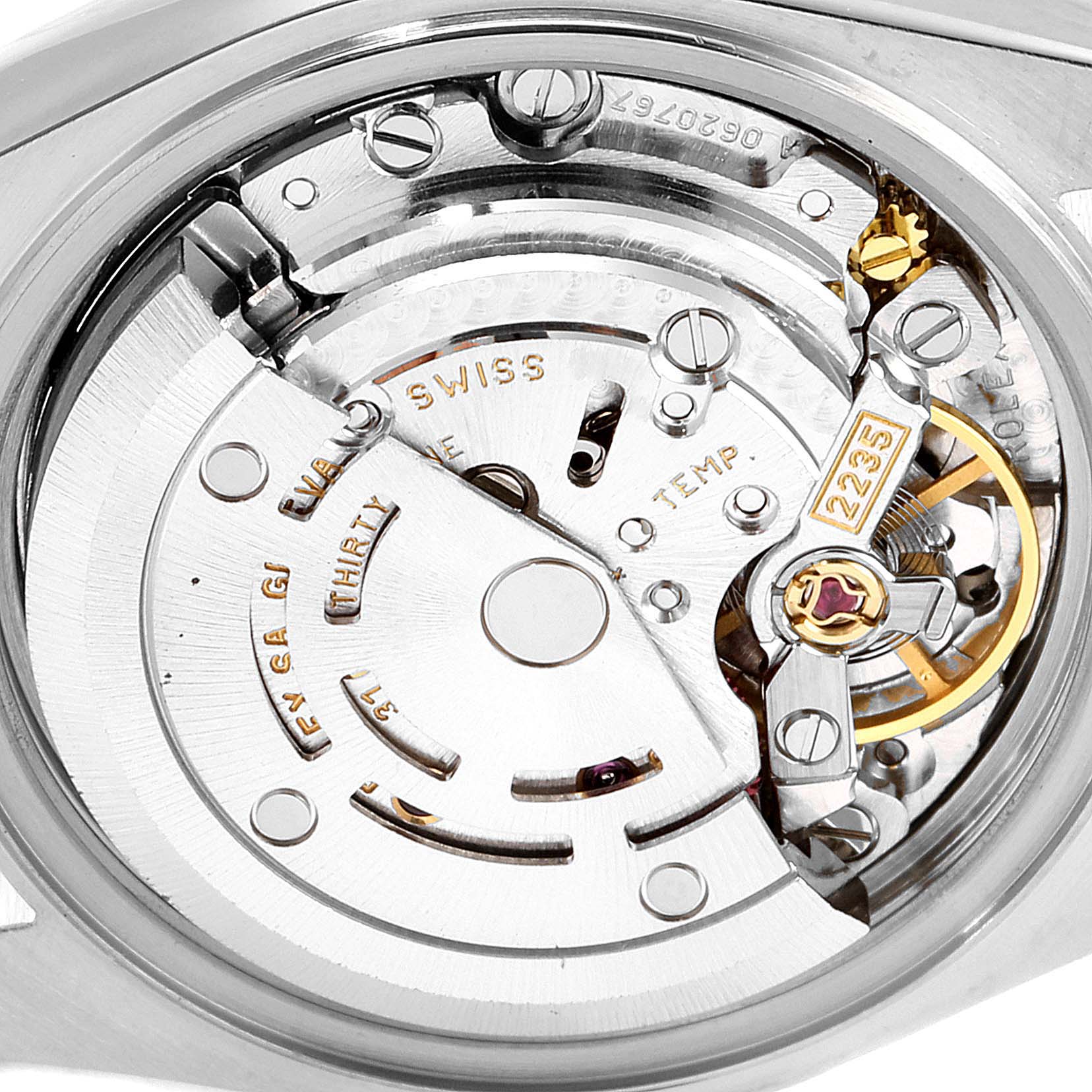 The image shows the internal mechanism and movement of the Rolex Datejust 79173 Women's Steel and Gold (two tone) Silver Dial 79173 Women's Steel and Gold (two tone) Silver Dial model watch from an angle showcasing the rotor and other components.