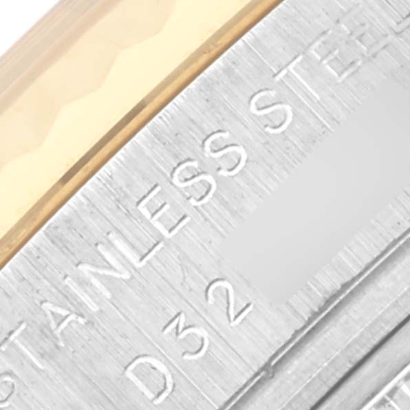 The image shows a close-up of the stainless steel casing edge of a Rolex Datejust 179173 Women's Steel and Gold (two tone) Silver Dial 179173 Women's Steel and Gold (two tone) Silver Dial watch.