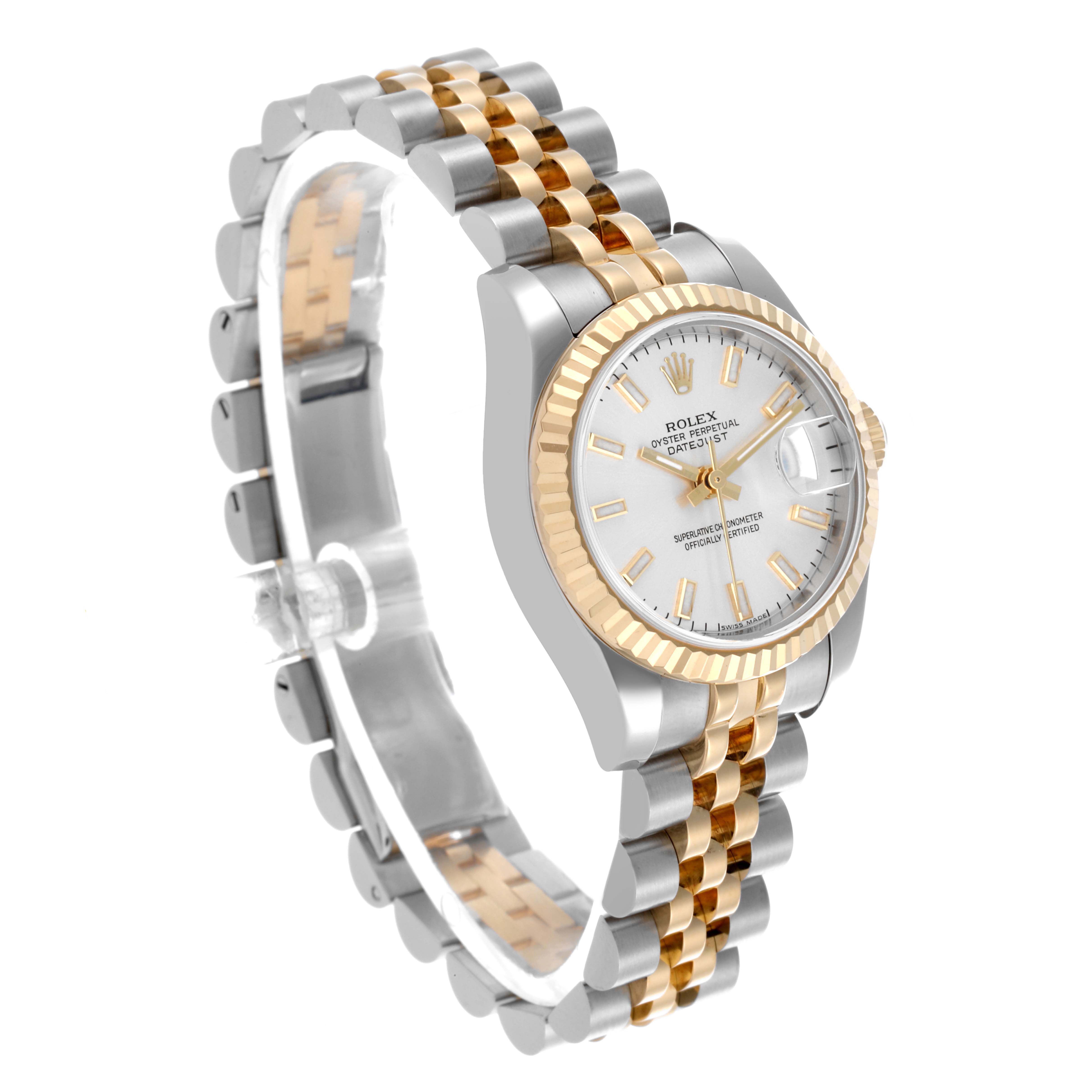 The Rolex Datejust 179173 Women's Steel and Gold (two tone) Silver Dial 179173 Women's Steel and Gold (two tone) Silver Dial watch is shown at an angled side view, highlighting the dial, bezel, and linked bracelet.