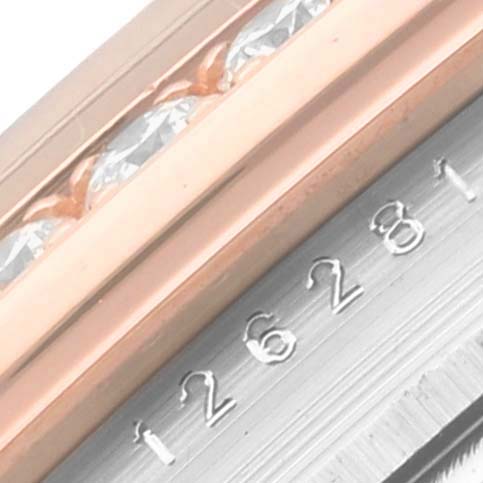 The image shows a close-up angle of the Rolex Datejust 126281RBR Men's Steel and Gold (two tone) Mother of Pearl Dial 126281RBR Men's Steel and Gold (two tone) Mother of Pearl Dial's engraved model number and part of the diamond-accented bezel.