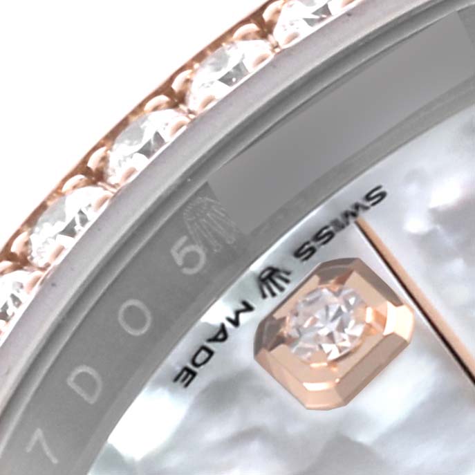 The image shows a close-up of a Rolex Datejust 126281RBR Men's Steel and Gold (two tone) Mother of Pearl Dial 126281RBR Men's Steel and Gold (two tone) Mother of Pearl Dial, highlighting the diamond bezel and part of the watch face with "SWISS MADE."