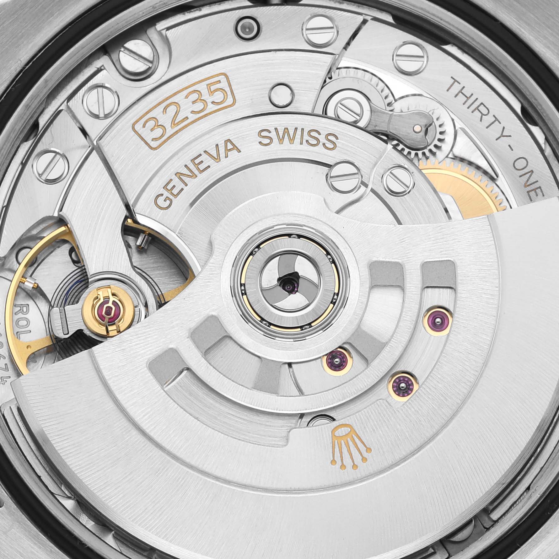 The image shows the intricate movement mechanism of a Rolex Datejust 126281RBR Men's Steel and Gold (two tone) Mother of Pearl Dial 126281RBR Men's Steel and Gold (two tone) Mother of Pearl Dial, highlighting the caliber 3235.