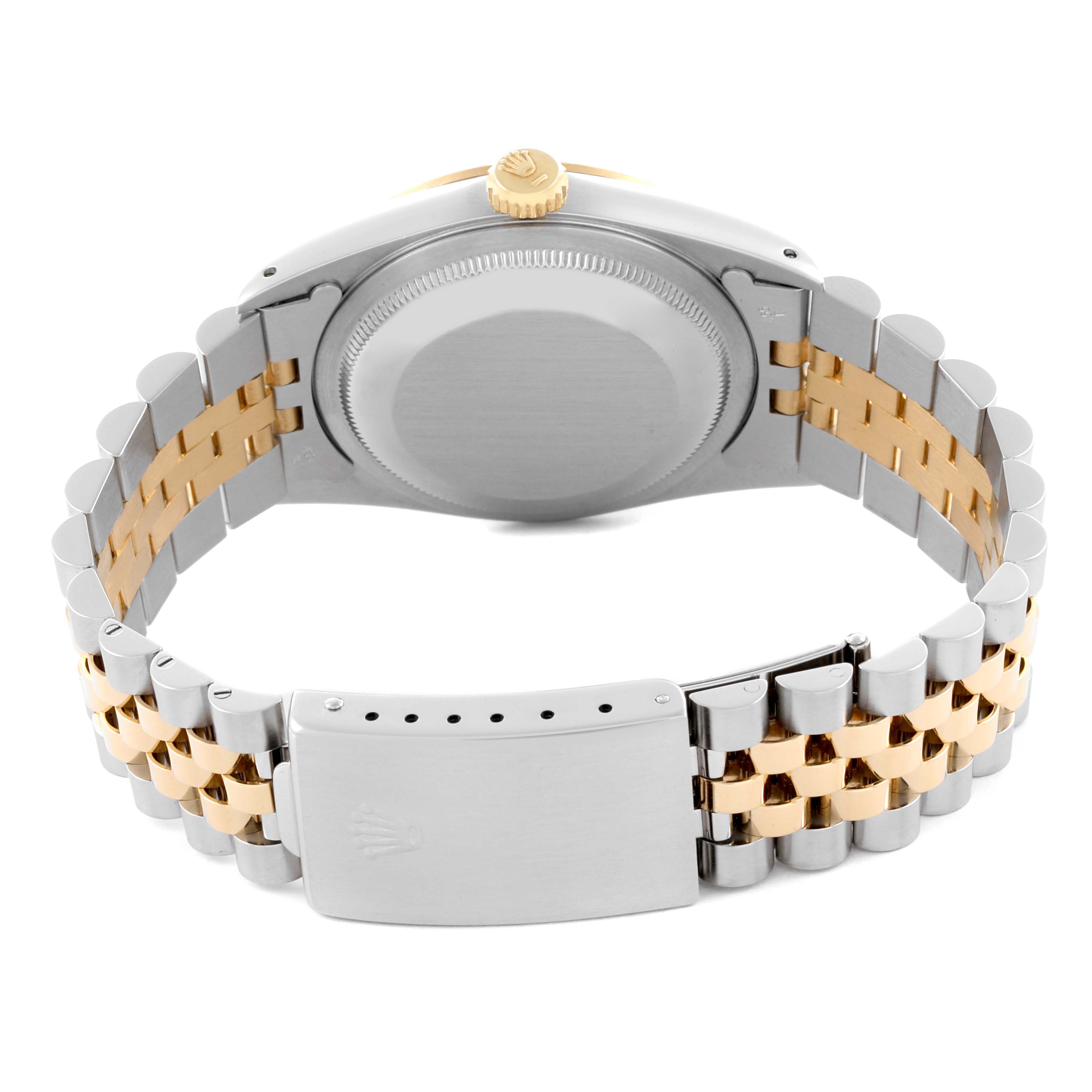 The image shows the case back and clasp of a Rolex Datejust 16233 Men's Steel and Gold (two tone) Silver Dial 16233 Men's Steel and Gold (two tone) Silver Dial, highlighting the two-tone bracelet.