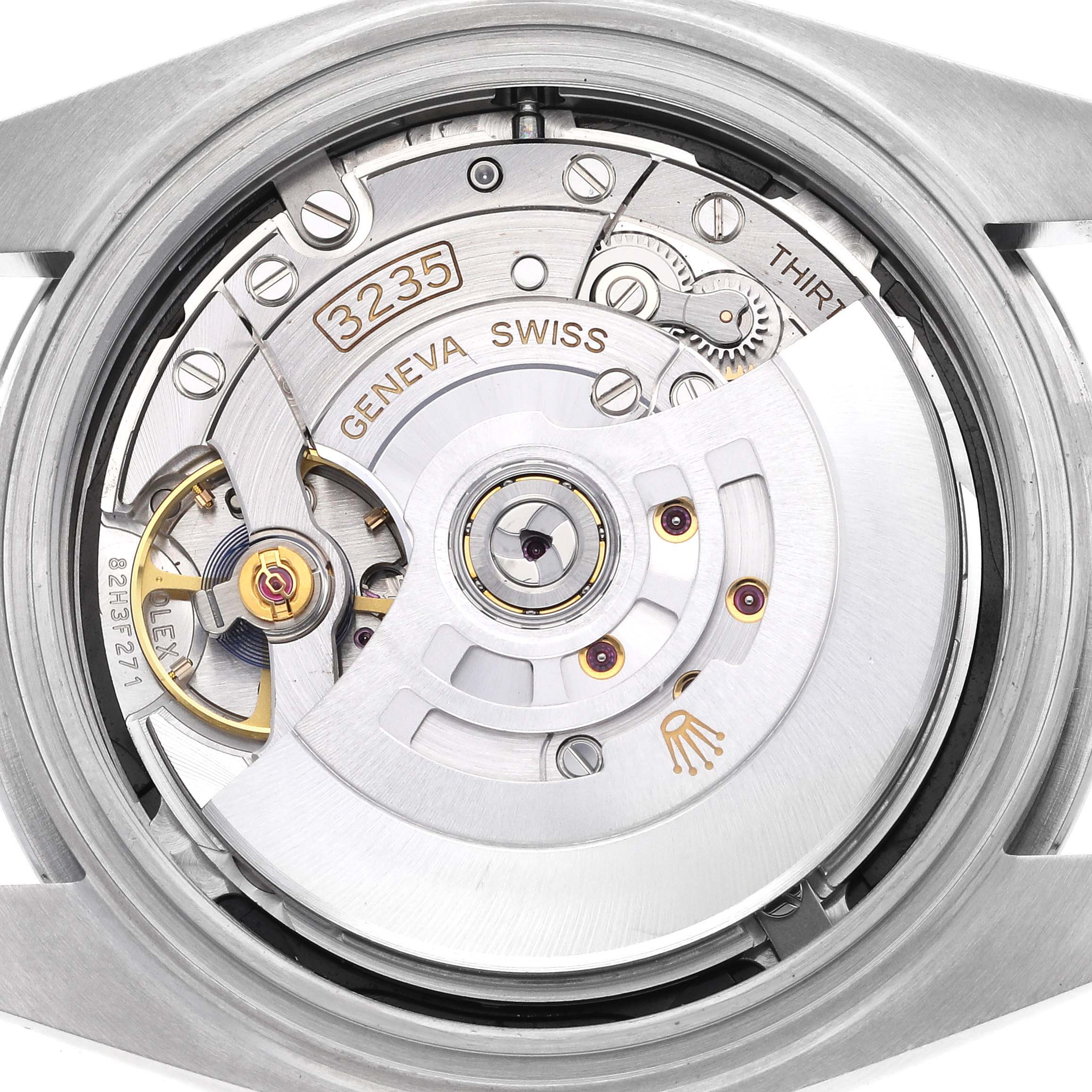 The image shows the movement of a Rolex Datejust 41 126300 Men's Stainless Steel Black Dial 126300 Men's Stainless Steel Black Dial from a back angle, highlighting the intricate inner mechanism.