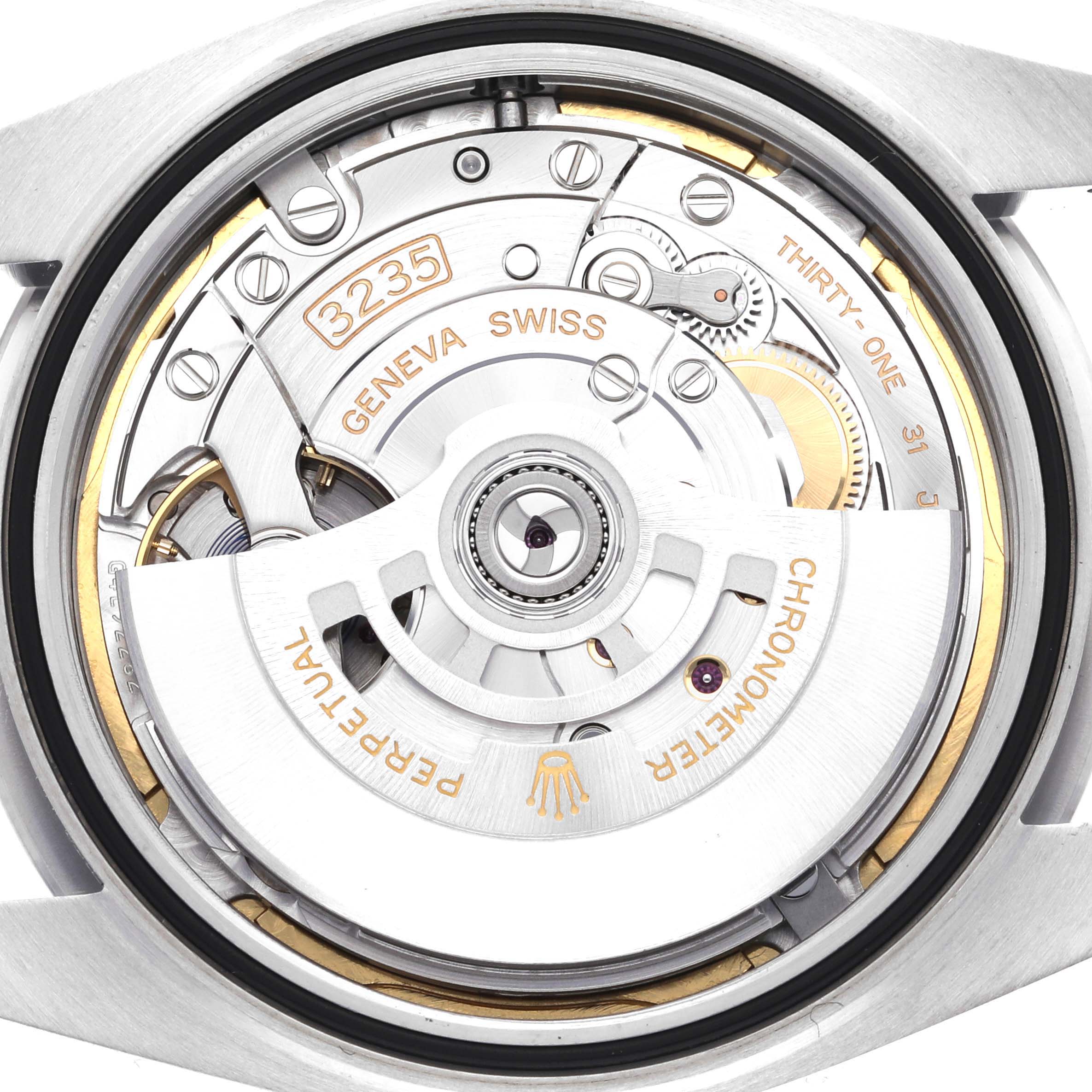 The image shows the movement of a Rolex Datejust 41 126300 Men's Stainless Steel Blue Dial 126300 Men's Stainless Steel Blue Dial, including the rotor and balance wheel, viewed from the back.