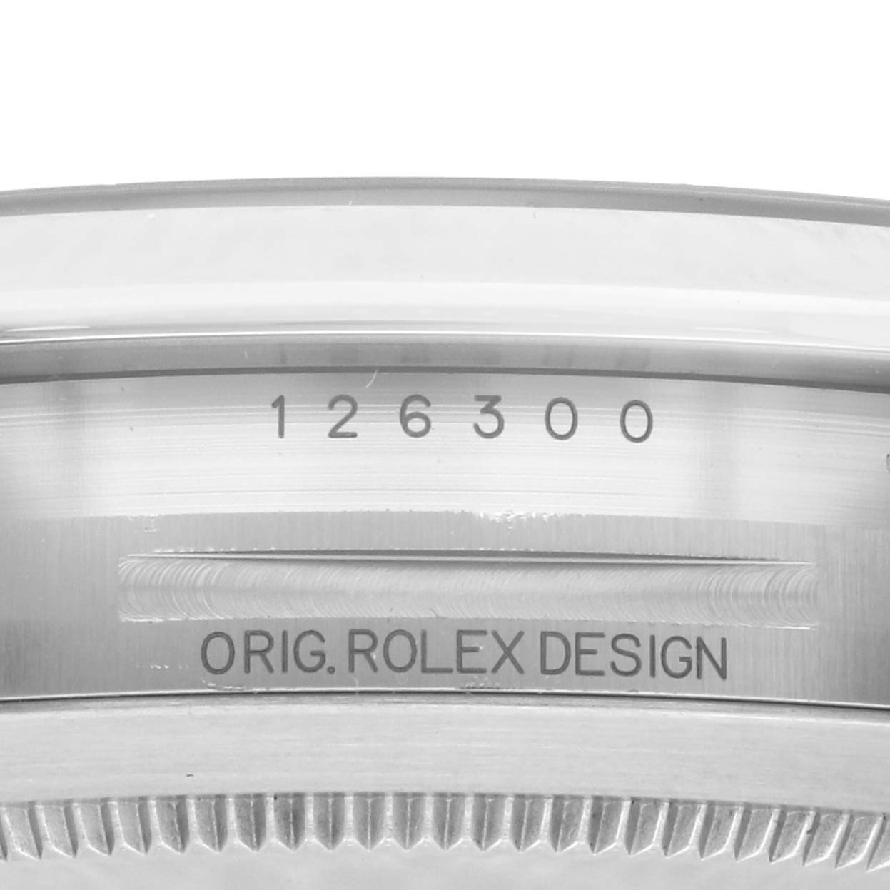 The image shows the side view of a Rolex Datejust 41 126300 Men's Stainless Steel Blue Dial 126300 Men's Stainless Steel Blue Dial model, focusing on the engraved bezel with serial details.