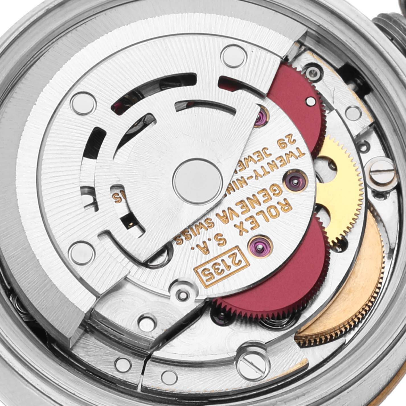 Close-up view of the movement mechanism of a Rolex Datejust 69173 Women's Steel and Gold (two tone) Blue Dial 69173 Women's Steel and Gold (two tone) Blue Dial model watch, showcasing gears and intricate components.