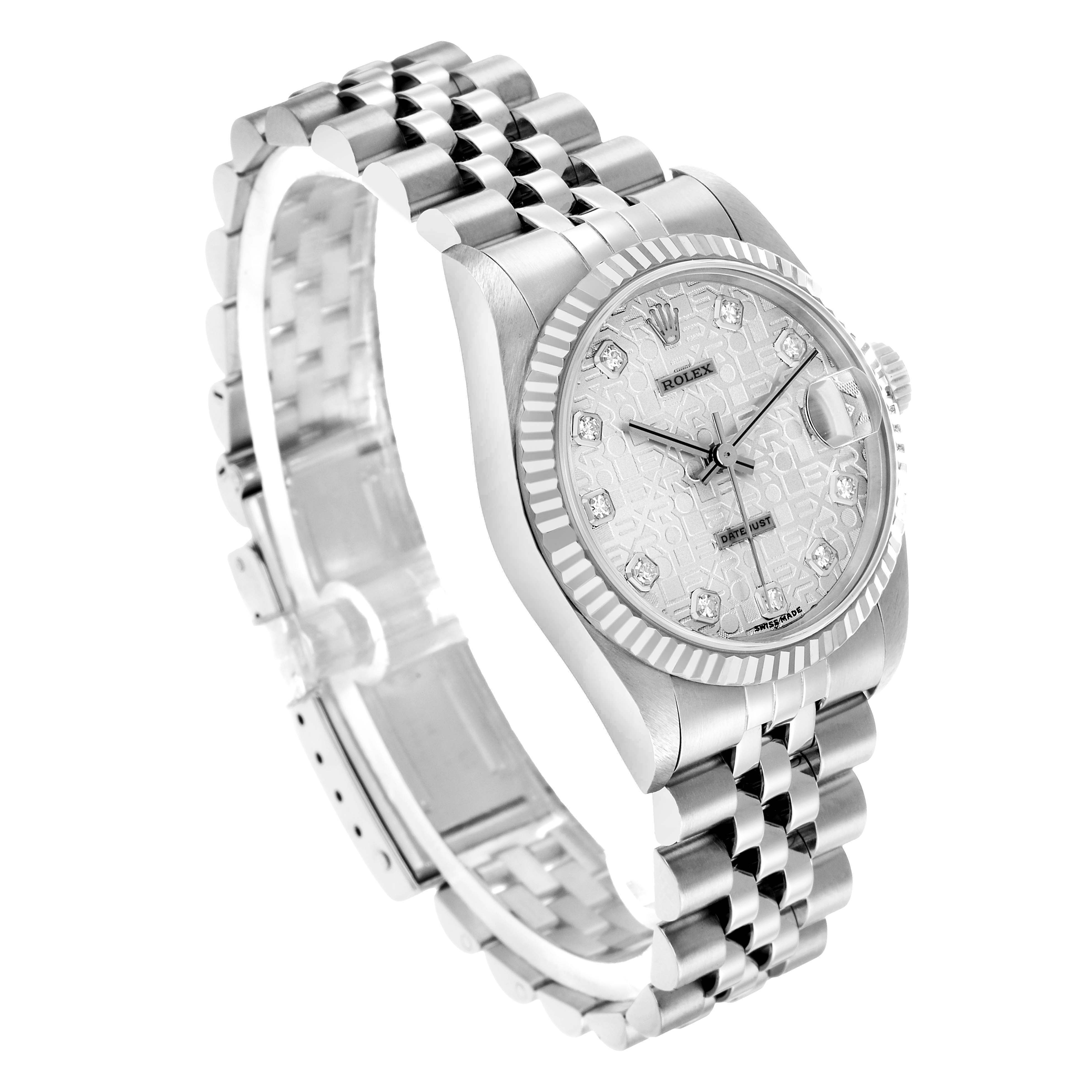 The Rolex Mid-Size 68274 Women's Stainless Steel Silver Dial watch is shown at a three-quarter angle, highlighting the dial, bezel, and bracelet.