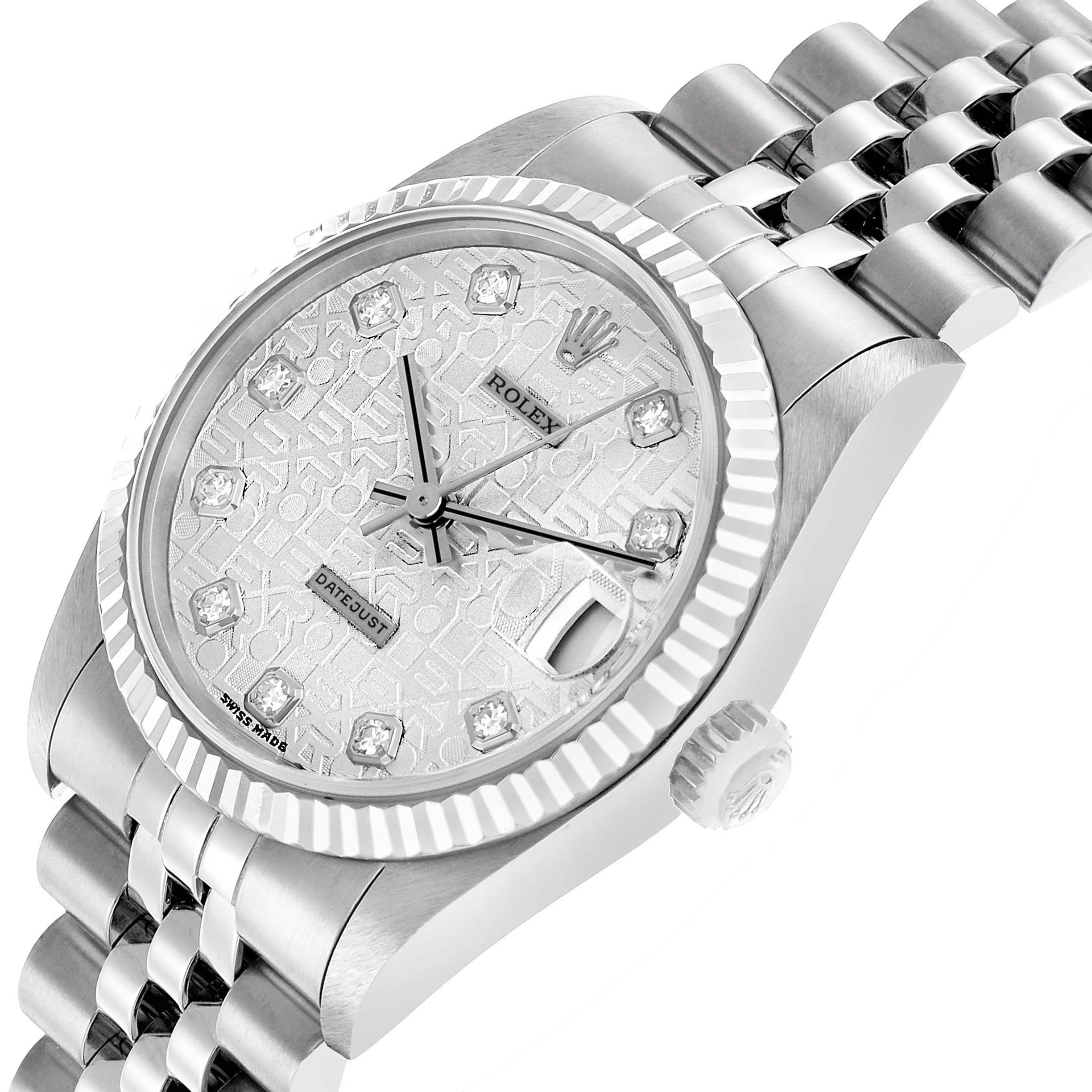The Rolex Mid-Size 68274 Women's Stainless Steel Silver Dial watch is shown at an angled view, highlighting its embossed dial, fluted bezel, cyclops lens, and bracelet.