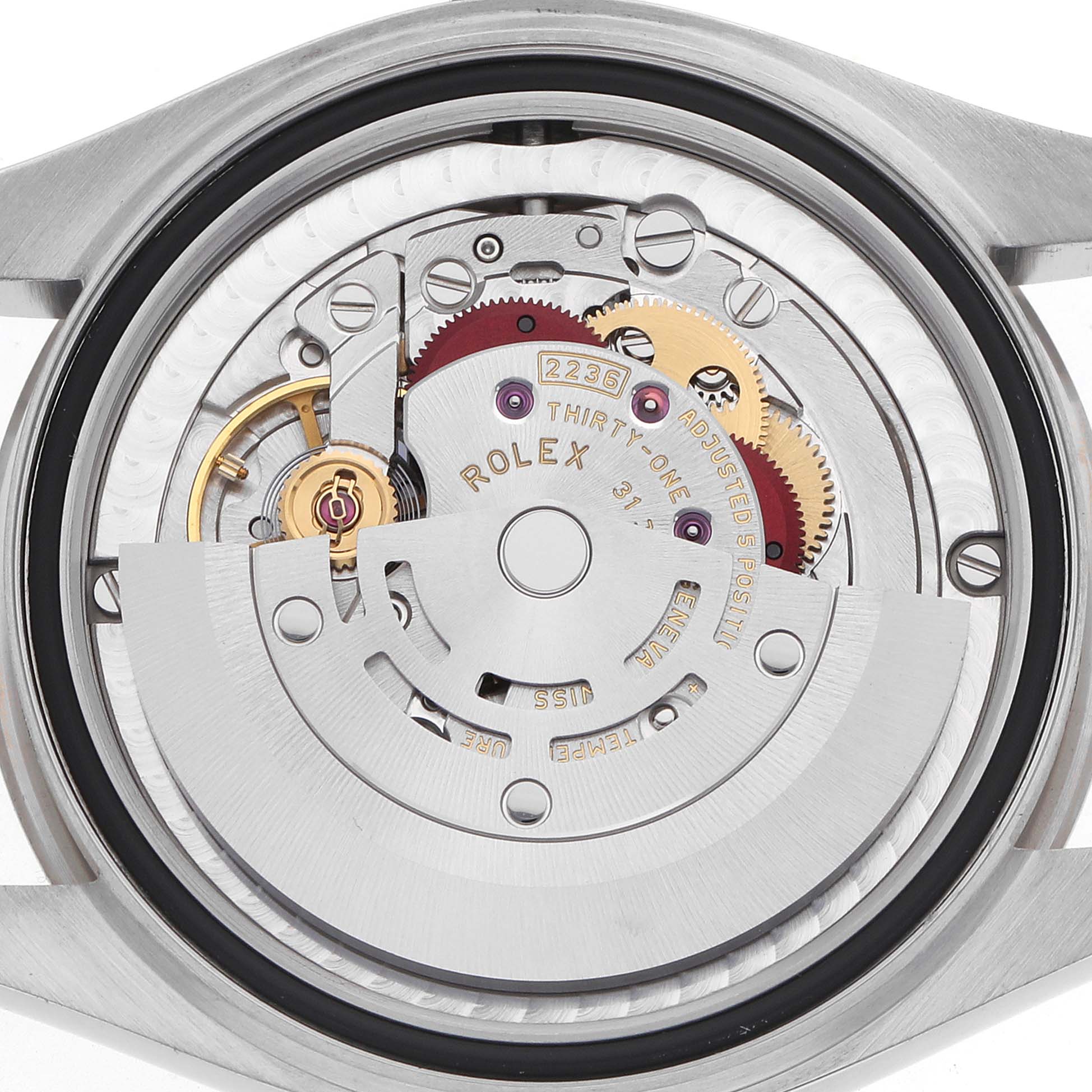 The image shows the Rolex Mid-Size 278274 Women's Stainless Steel Mother of Pearl Dial model's open back, displaying its intricate movement and rotor mechanism.