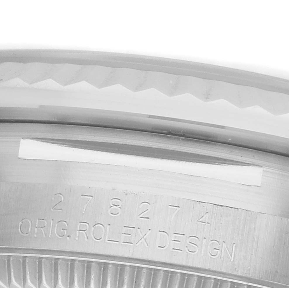 The image shows a close-up of the side engraving on the bezel of a Rolex Mid-Size 278274 Women's Stainless Steel Mother of Pearl Dial watch.
