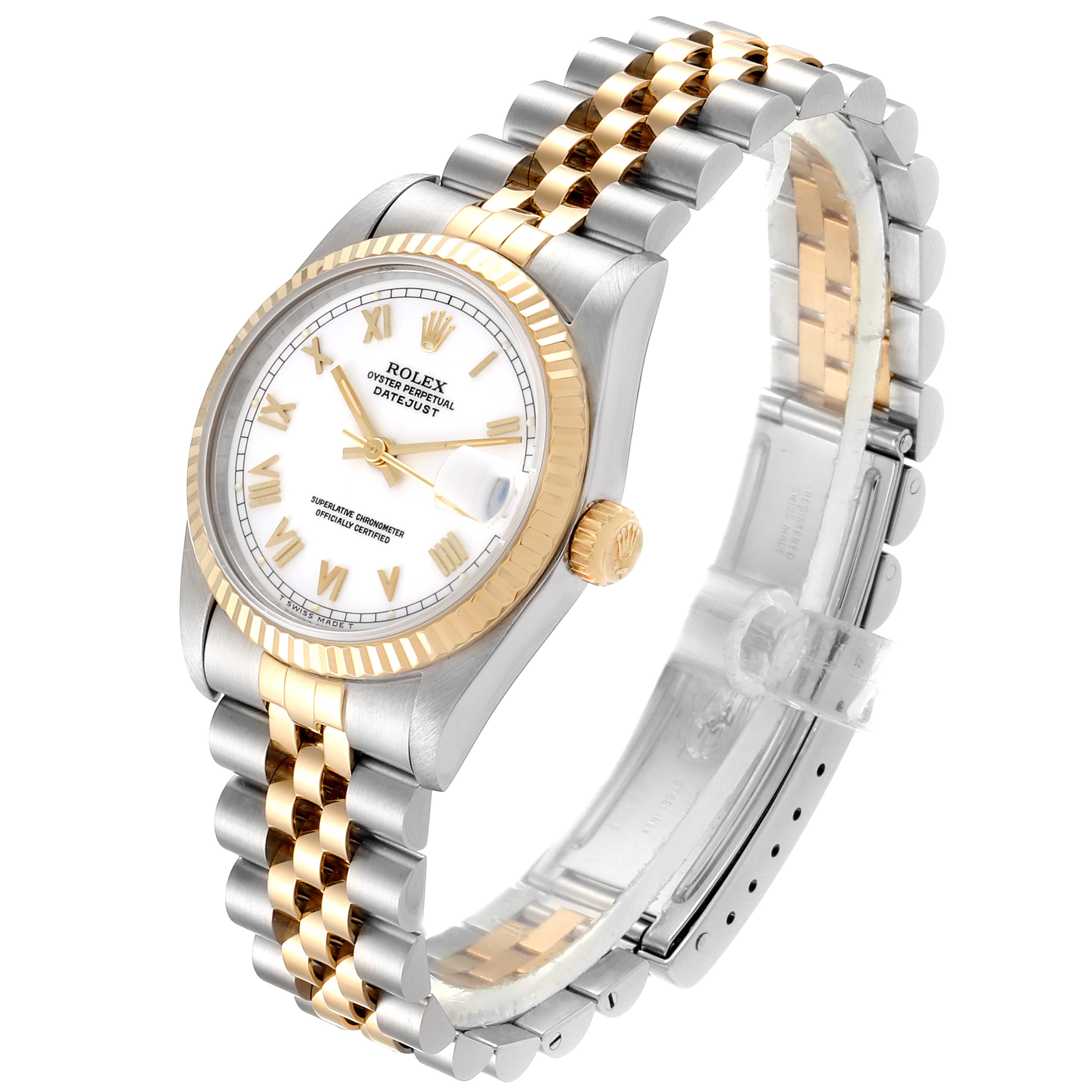 This is a Rolex Mid-Size 68273 Women's Steel and Gold (two tone) White Dial 68273 Women's Steel and Gold (two tone) White Dial model watch, shown from an angled side view, highlighting the face, bezel, crown, and bracelet.