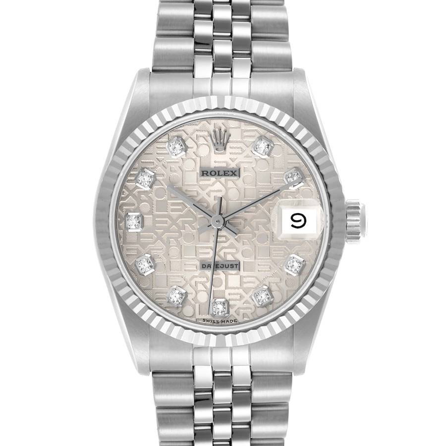 The Rolex Mid-Size watch is shown from the front, highlighting the dial, bezel, bracelet, and date display.