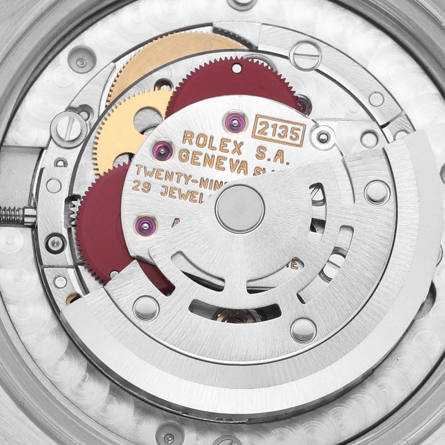 The image shows the intricate internal mechanism of a Rolex Mid-Size 68274 Women's Stainless Steel Silver Dial 68274 Women's Stainless Steel Silver Dial model watch from a top-down angle.