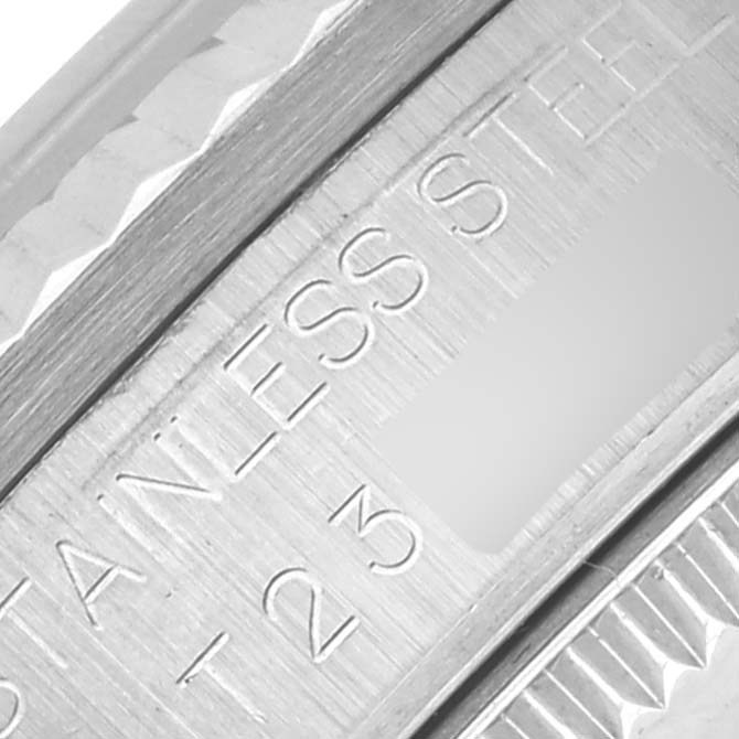 The image shows a close-up of the side engraving on a Rolex Mid-Size 68274 Women's Stainless Steel Silver Dial 68274 Women's Stainless Steel Silver Dial model, highlighting the stainless steel marking.