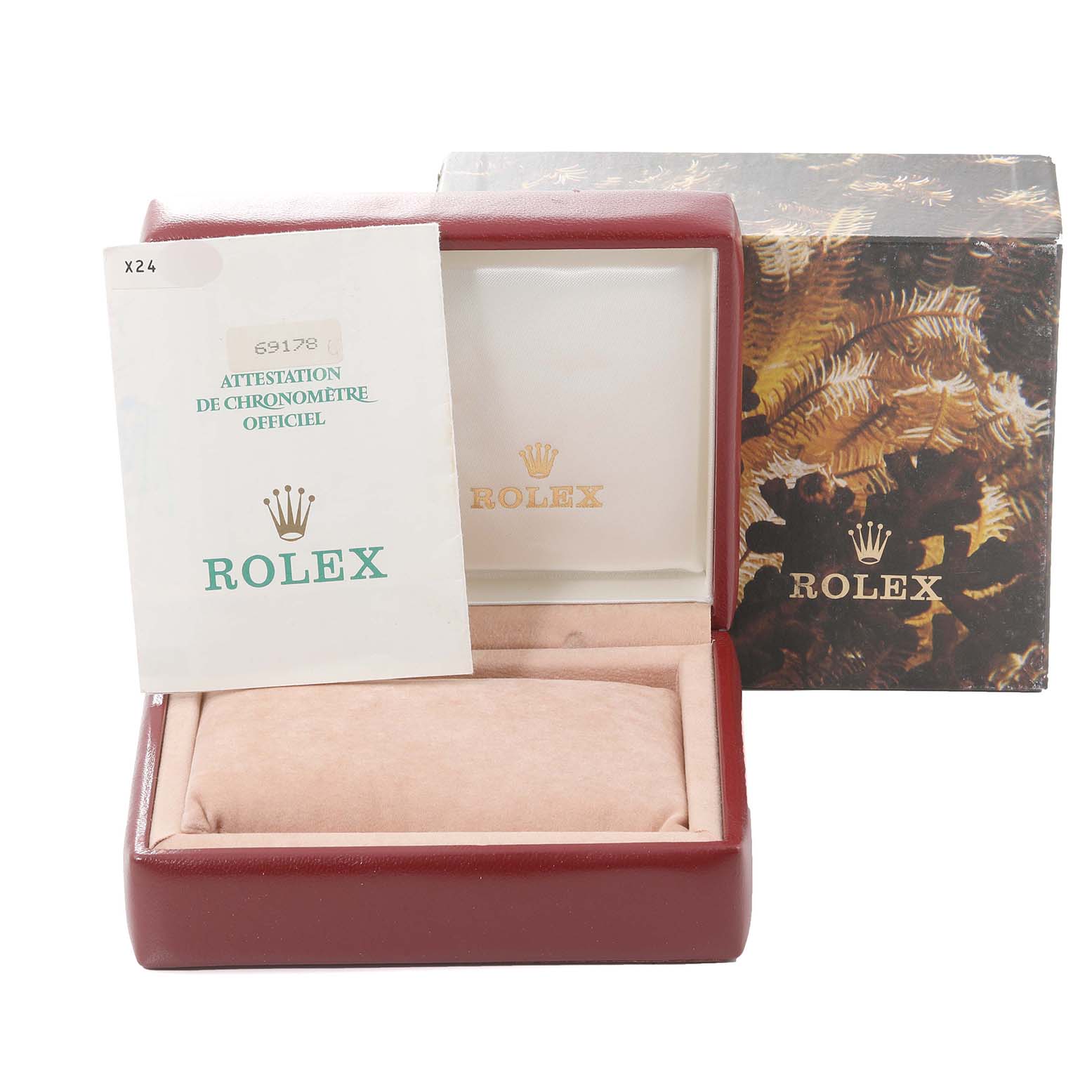 The image shows the packaging and certificate for a President model Rolex watch, including the box and manual.