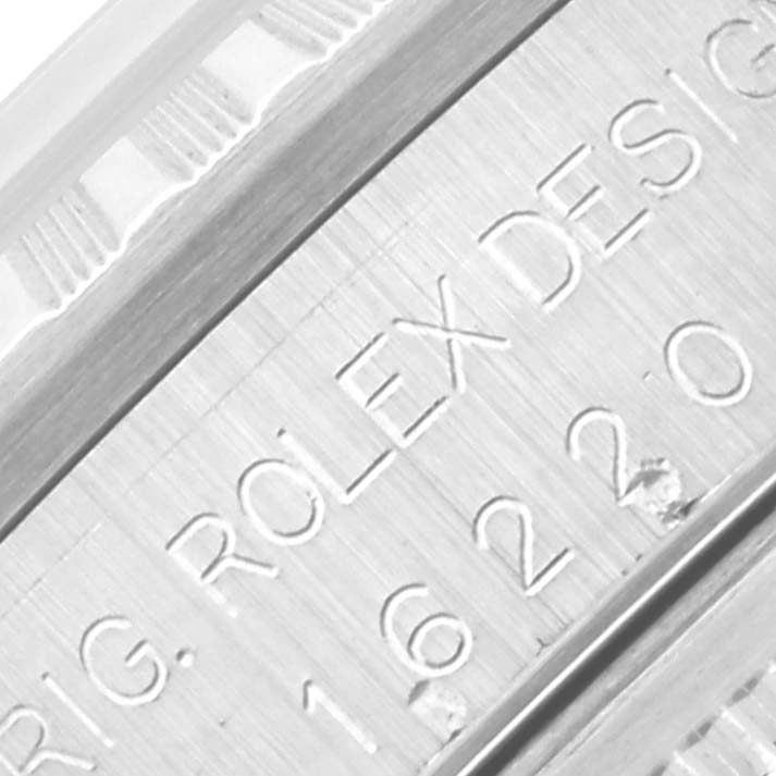 The image shows an engraved side view of the Rolex Datejust 16220 Men's Stainless Steel Silver Dial 16220 Men's Stainless Steel Silver Dial case with the model number.