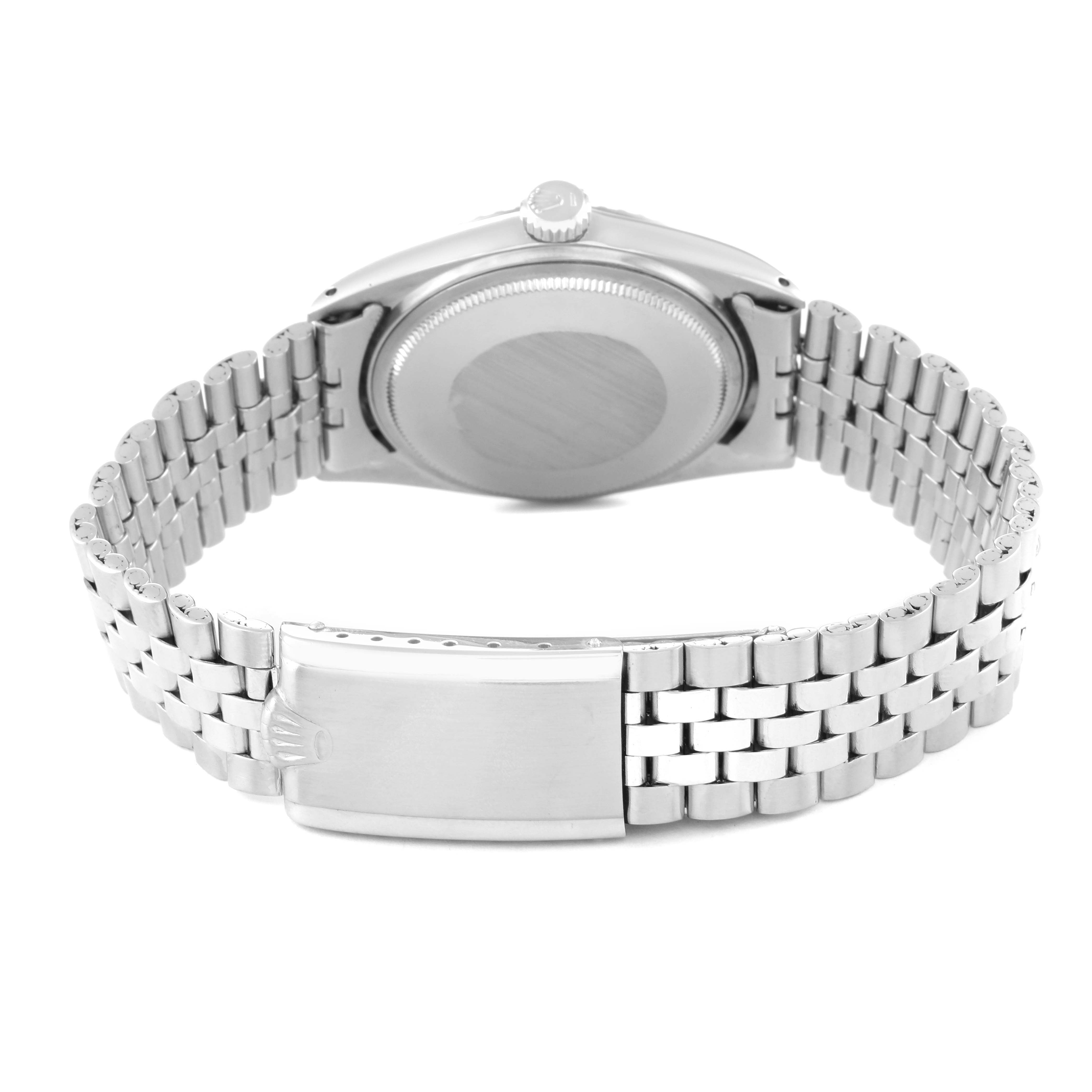 The Rolex Vintage Collection 1603 Men's Stainless Steel Silver Dial 1603 Men's Stainless Steel Silver Dial watch is shown from the back, highlighting the closed clasp and the case back.