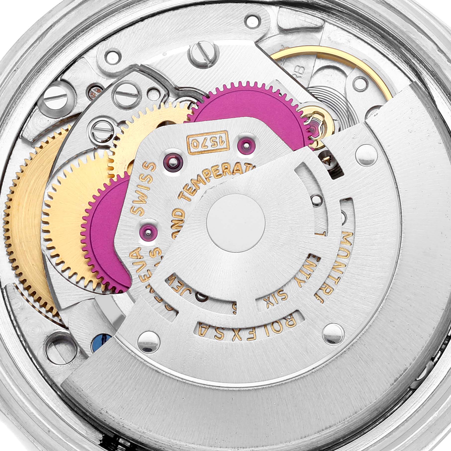 The image shows a close-up view of the movement mechanism of a Vintage Collection Rolex watch.