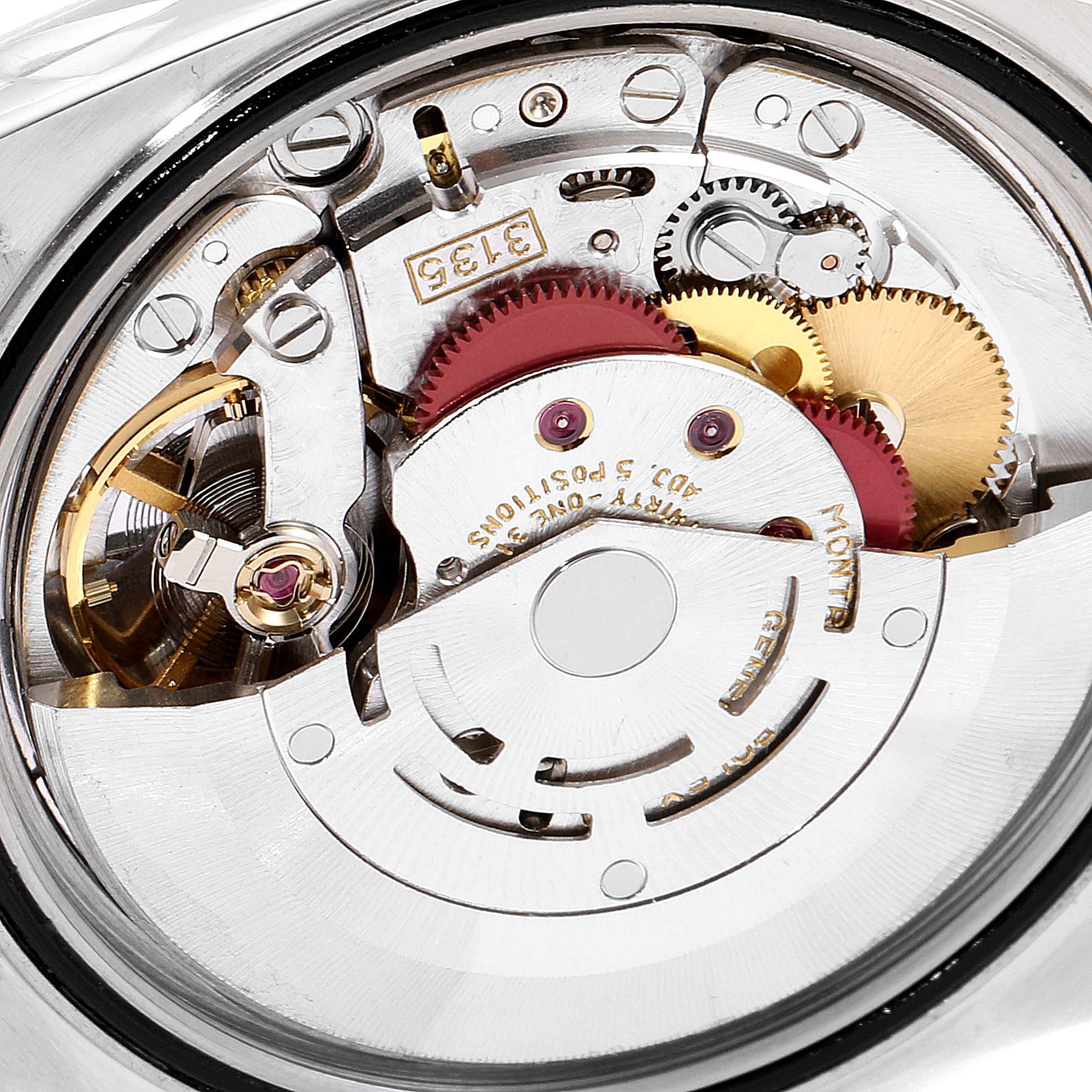 The image shows an interior view of a Rolex Datejust 16233 Men's Steel and Gold (two tone) Champagne Dial 16233 Men's Steel and Gold (two tone) Champagne Dial watch, focusing on its intricate mechanical movement.