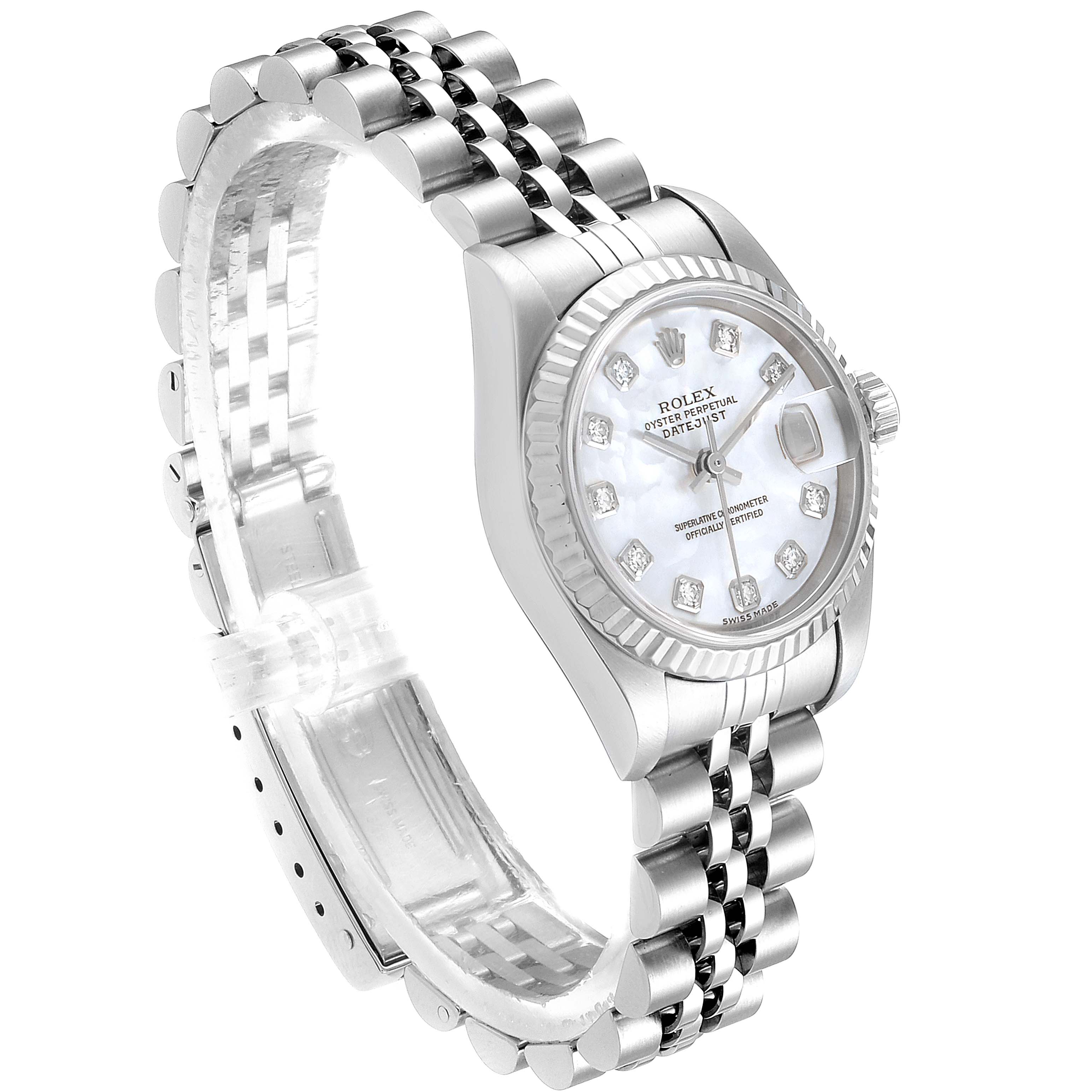 The Rolex Datejust 79174 Women's Stainless Steel Mother of Pearl Dial 79174 Women's Stainless Steel Mother of Pearl Dial watch is shown at an angled view, displaying its face, bezel, bracelet, and partially open clasp.