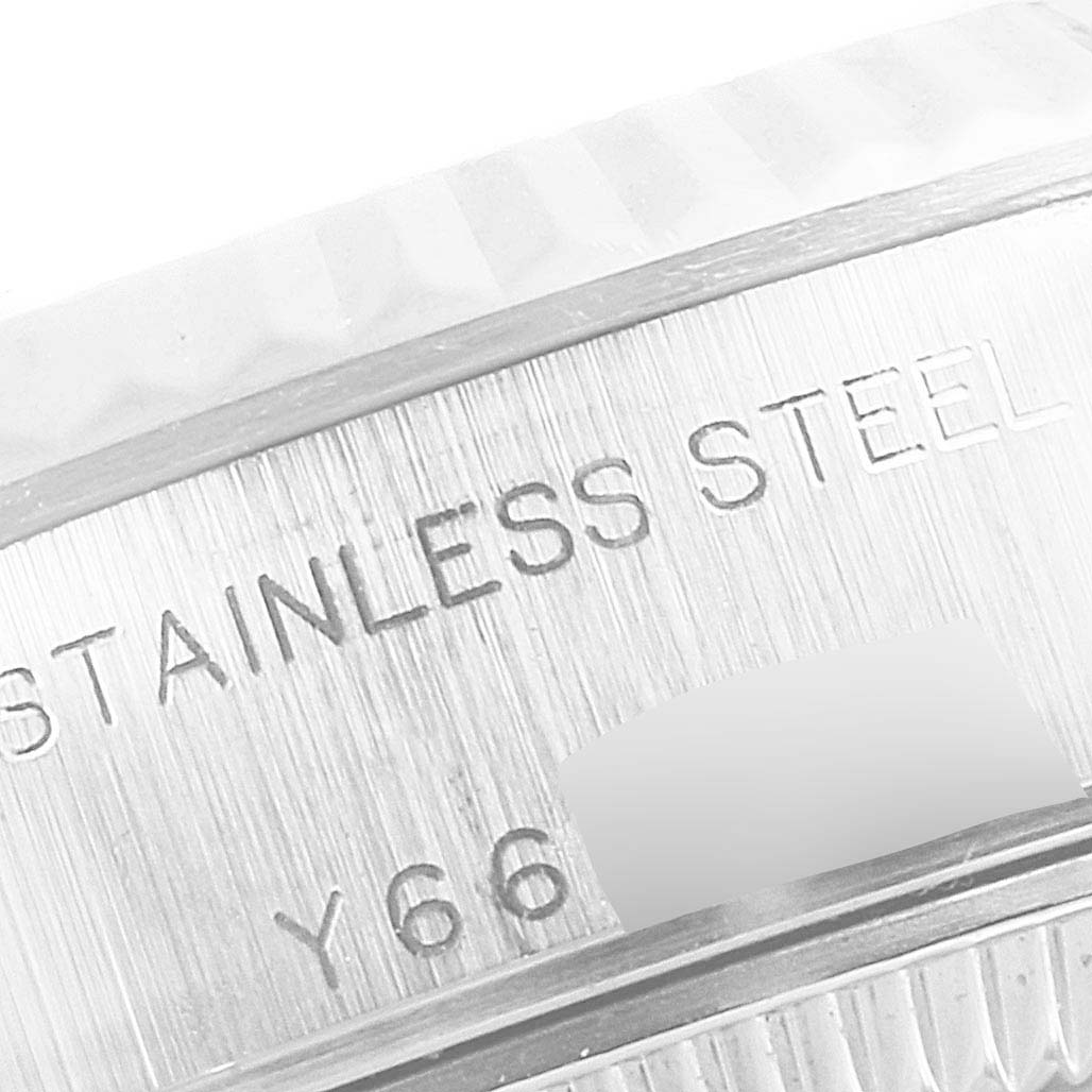 This close-up image shows the engraved stainless steel back of a Rolex Datejust 79174 Women's Stainless Steel Mother of Pearl Dial 79174 Women's Stainless Steel Mother of Pearl Dial watch.