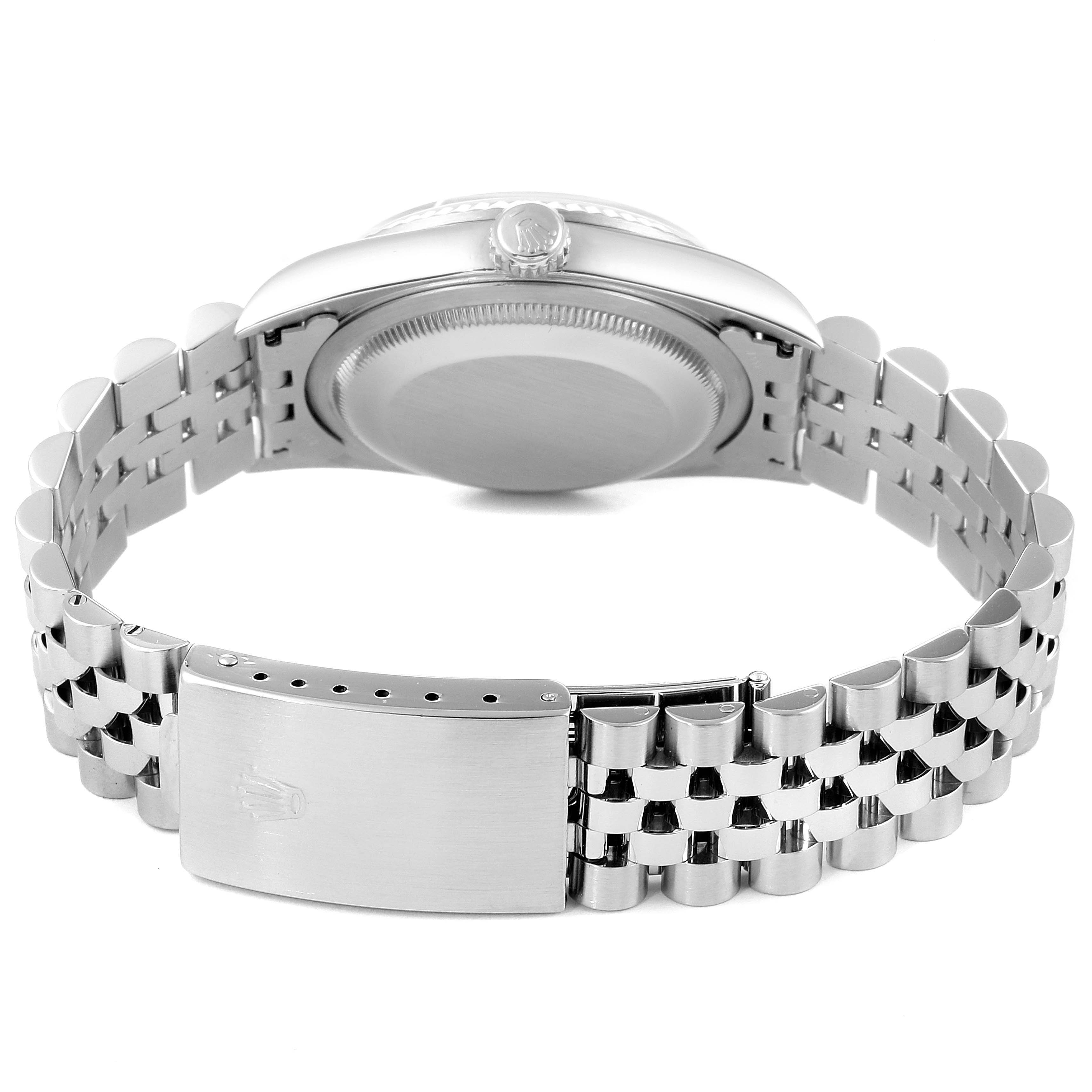 This image shows the back view of a Rolex Datejust 16234 Men's Stainless Steel Silver Dial 16234 Men's Stainless Steel Silver Dial watch displaying its case back and bracelet.