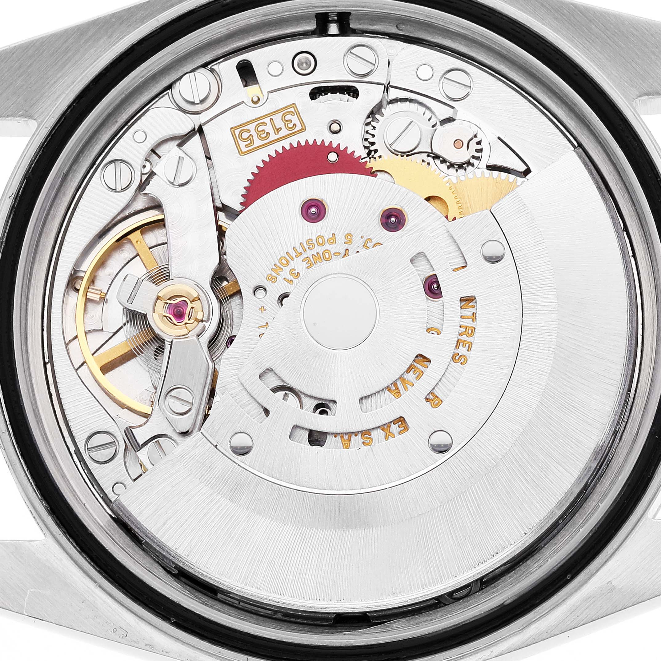 This image shows the movement and internal mechanism of a Rolex Datejust 16233 Men's Steel and Gold (two tone) Black Dial 16233 Men's Steel and Gold (two tone) Black Dial model from a rear view angle.